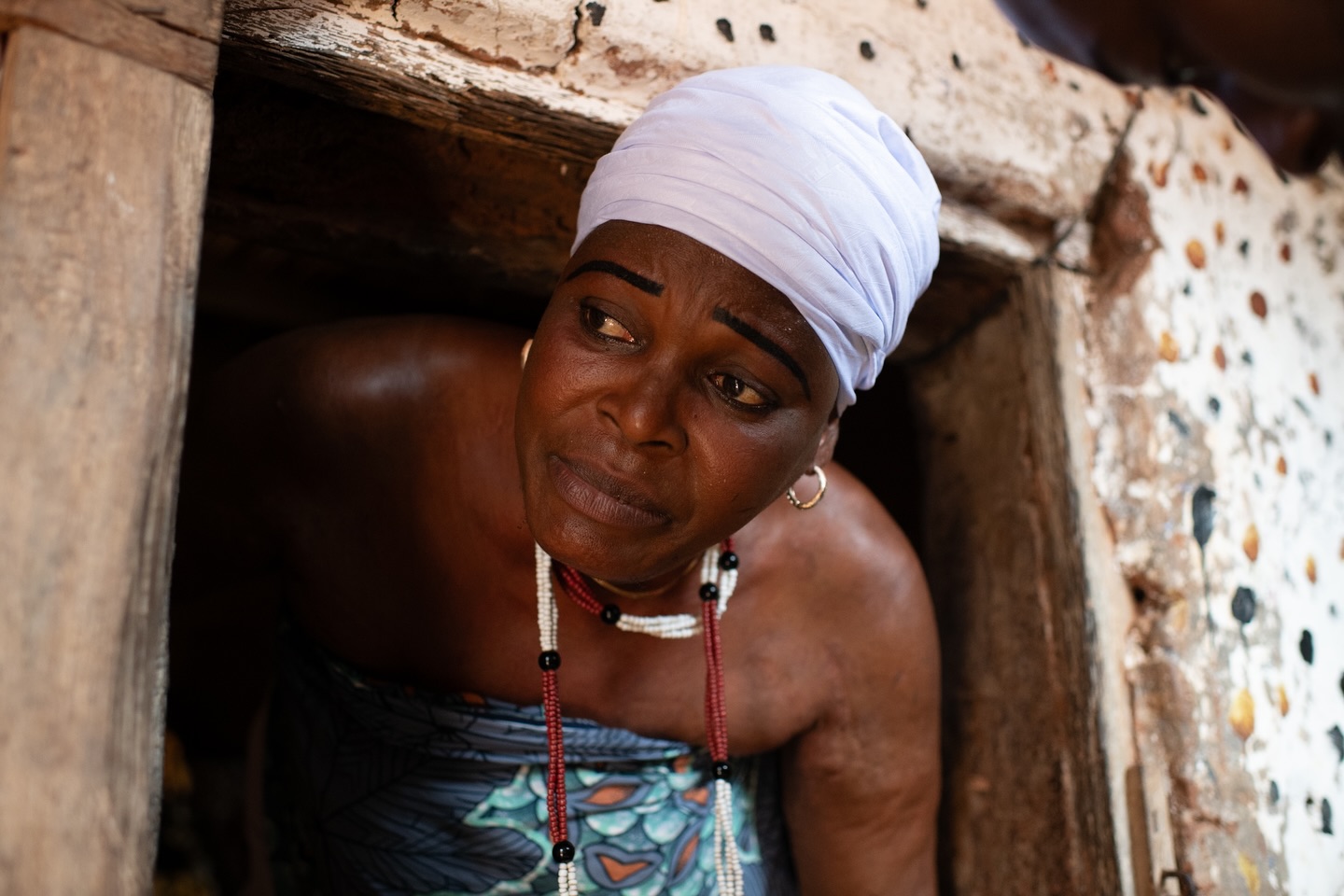 A Vodoun priestess prepares Sathpata ritual. Position of women in the Vodoun cosmology is entirely equal with a man. The cosmology is originally rooted in a single creator principle, Mawu‑Lisa, uniting female and male forces and placing complementarity between women and men at the foundation of the system. Over time, however, institutional structures have largely developed in patriarchal directions, while some women still hold powerful ritual and social roles, the highest positions are generally reserved for men. In last years women realised the shift of power and are challenging the disproportion by winning back higher positions and educating new generations.
#womenphotographers #gettyreportage #natgeoyourshots