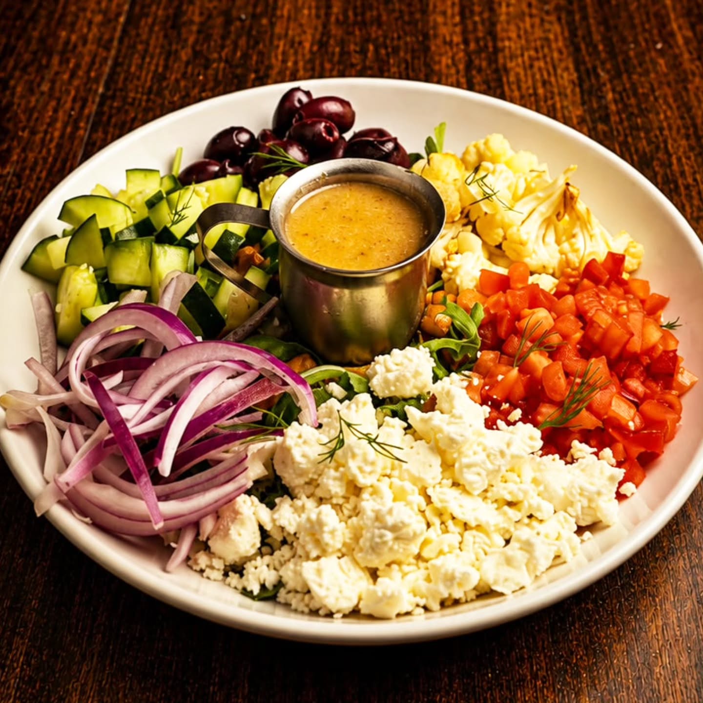 Mediterranean Bowl
Chickpeas, Lentils, Kalamata Olives, Cucumber, Cauliflower, Red Onion, Tomato, Arugula, Fresh Dill, Feta Cheese & Greek Vinaigrette