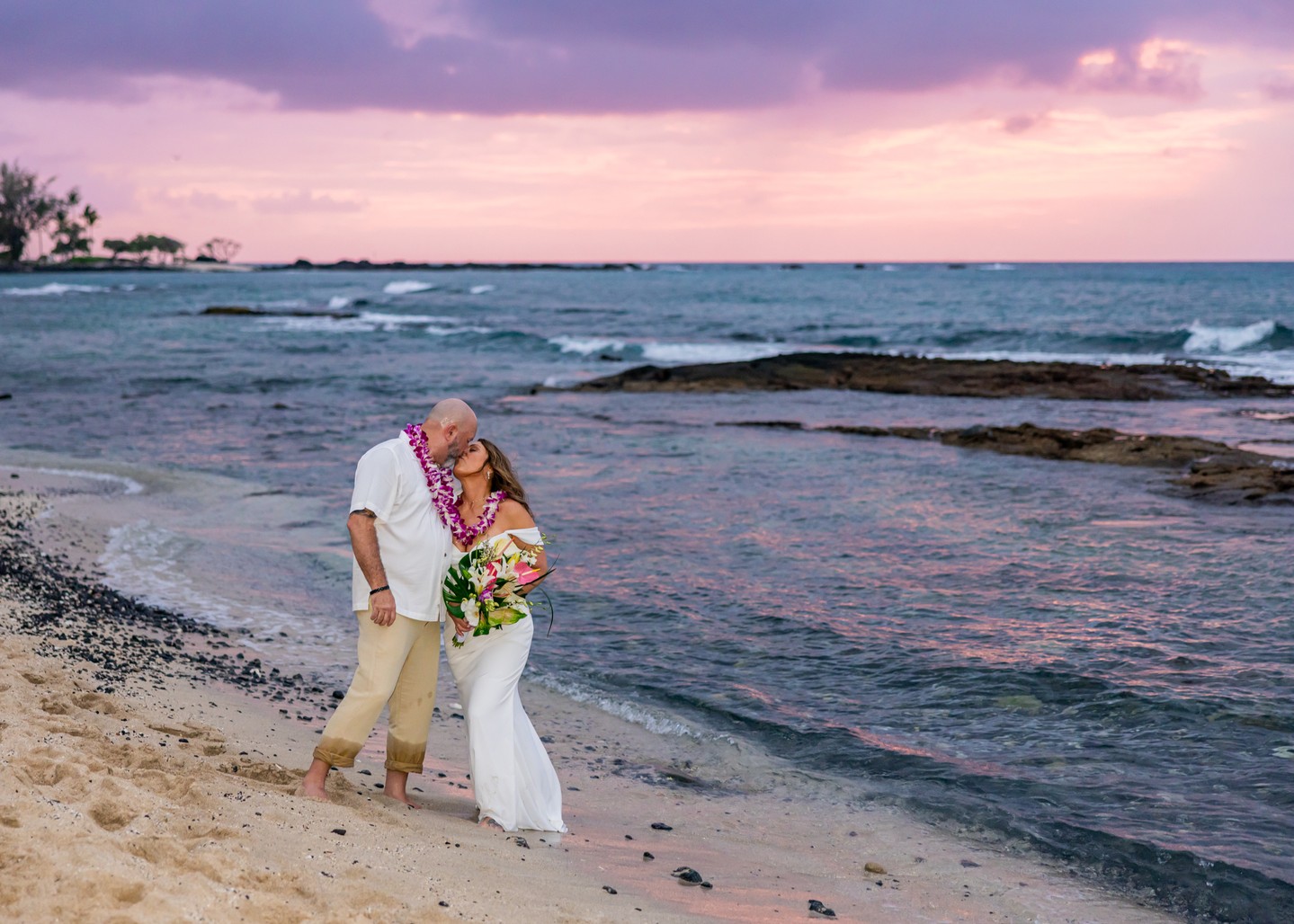 Here's to Kelly & Chris - married with us this last winter at the beautiful Kuki`o Beach.
Blessings & Aloha to this couple who eloped intimately, but Facetimed in their family so they could be present.
Kelly & Chris were blessed with a Hawaii's pastel sunset skies during their evening photo session with our team. Congratulations to the newlyweds!
#BigIslandWedding #KukioBeachWedding #HawaiiElopement #KonaWeddingOfficiant #JustMarried
www.konaweddingofficiant.com/elopements
