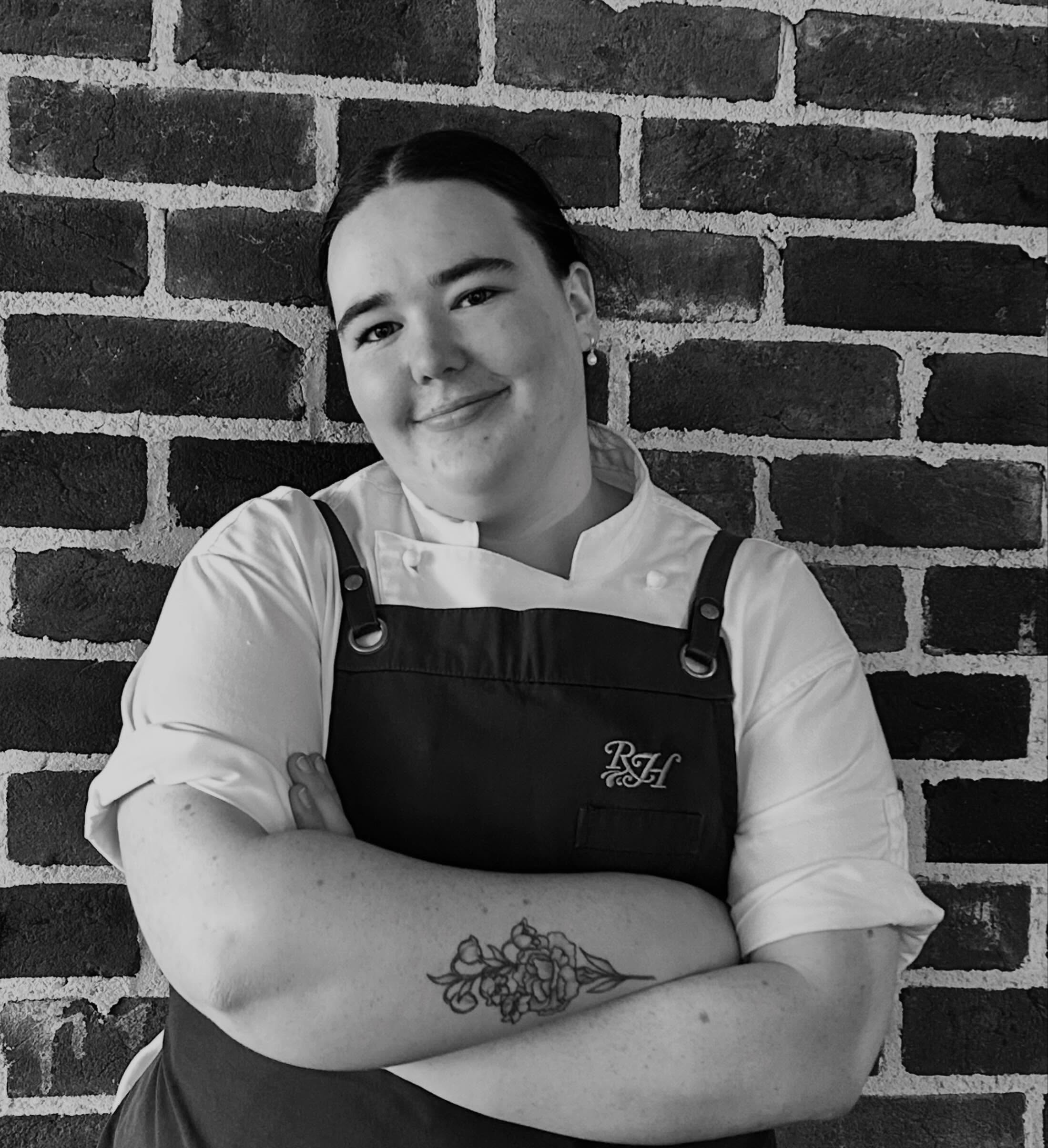 Meet Our Head Chef, Caitlin
It’s about time we gave a proper introduction to the talent leading our kitchen.
Caitlin Baxter has been part of the Rosalie House family for the past 12 weeks, and at just 23 years old, she brings an incredible combination of skill, passion, and experience to our team.
Born and raised in Toowoomba, Caitlin began her culinary journey in 2021 when she started her apprenticeship at the renowned Encore’s Restaurant. It didn’t take long for her talent and dedication to shine through, earning her the prestigious Apprentice of the Year award in 2024.
That achievement led to a Queensland Overseas Foundation Scholarship, taking Caitlin to Europe, where she worked at Valour, a restaurant awarded two AA Rosettes for culinary excellence — a recognition reserved for restaurants demonstrating exceptional standards, precision, and consistency in their cooking.
After her time abroad, Caitlin was excited to return home to Queensland, be closer to family, and take on the role of Head Chef here at Rosalie House.
When she’s not creating beautiful dishes in the kitchen, you’ll find her line dancing, painting, belting out a singalong, or enjoying her favourite Disney movies.
We’re incredibly fortunate to have such a talented young chef leading our culinary team, and we can’t wait for you to experience her food.
Please join us in giving Caitlin a warm Rosalie House welcome.