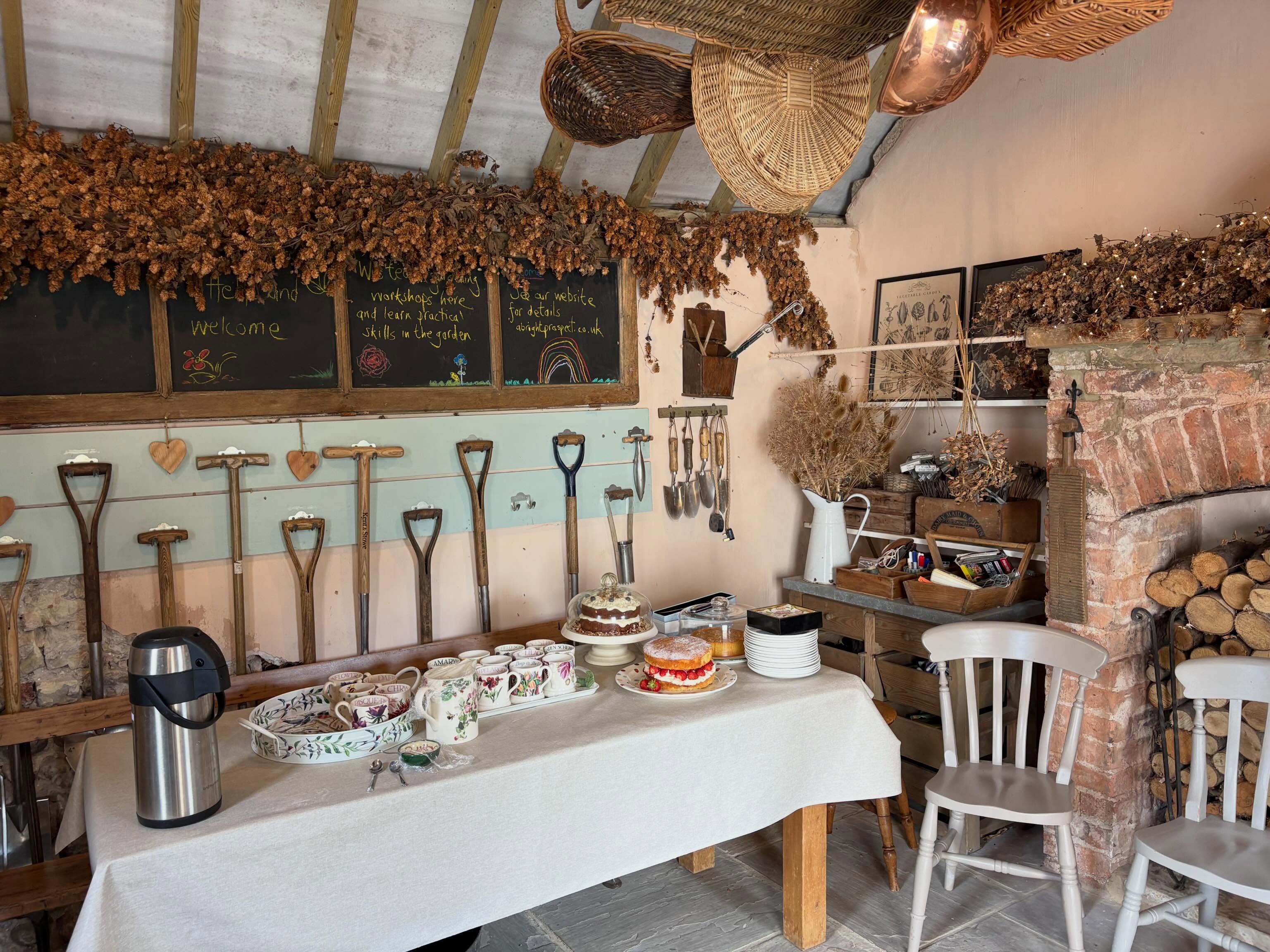 Spot the cakes! Potting shed all set up for the sell out workshop on flowers for cutting. @elaine_hadfield_floraldesigner led a super demonstration following sustainable floristry principles. Time was spent outdoors spilt into groups, analysing the border structure and colour themes. We quickly put plan B in place given the gazebo had blown way overnight. Much more time was spent in the cosy potting shed and kitchen. Phew! #gardenworkshops #gardenclasses #gardencourses #sustainablefloristry #gardenersofinstagram🌱