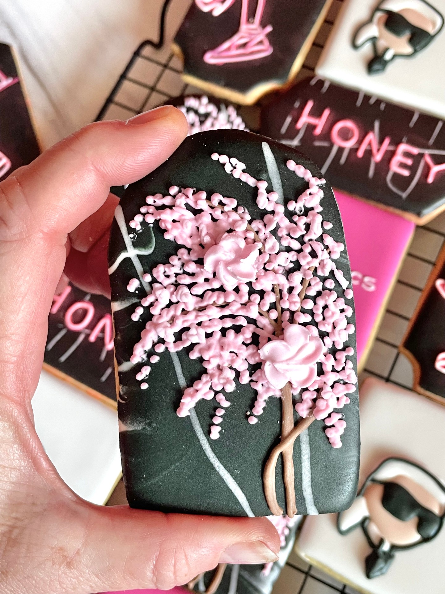 I did the coolest cherry blossom and Neon cookie set, pulling out all the stops for the re-launch of Hydraulic Femme’s newly renovated Mall of Africa store. We took inspiration from photos of the beautiful store design. Hot pink turned out to be impossible for my printer so I hand iced the tiniest writing ever. Truly a custom cookie set reflecting the essence of the client.
DM for enquiries.
#johannesburgbaker #neonsigncookies #corporatecookies #logocookies #karllagerfeld