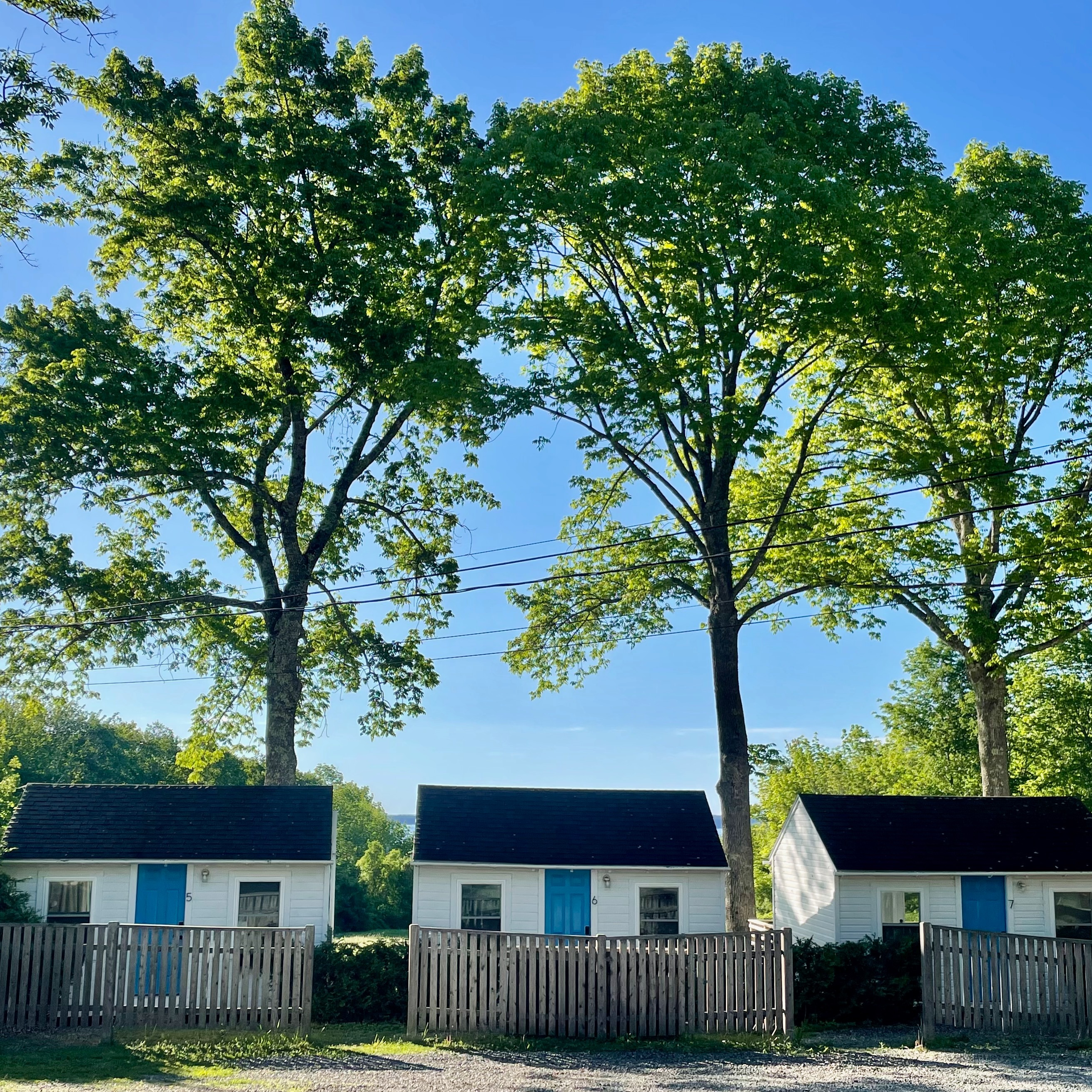Wish you were here? Book now for a really cute cabin! Happy summer. #lincolnvillemotel #cabins #summer2026 #openforbusiness