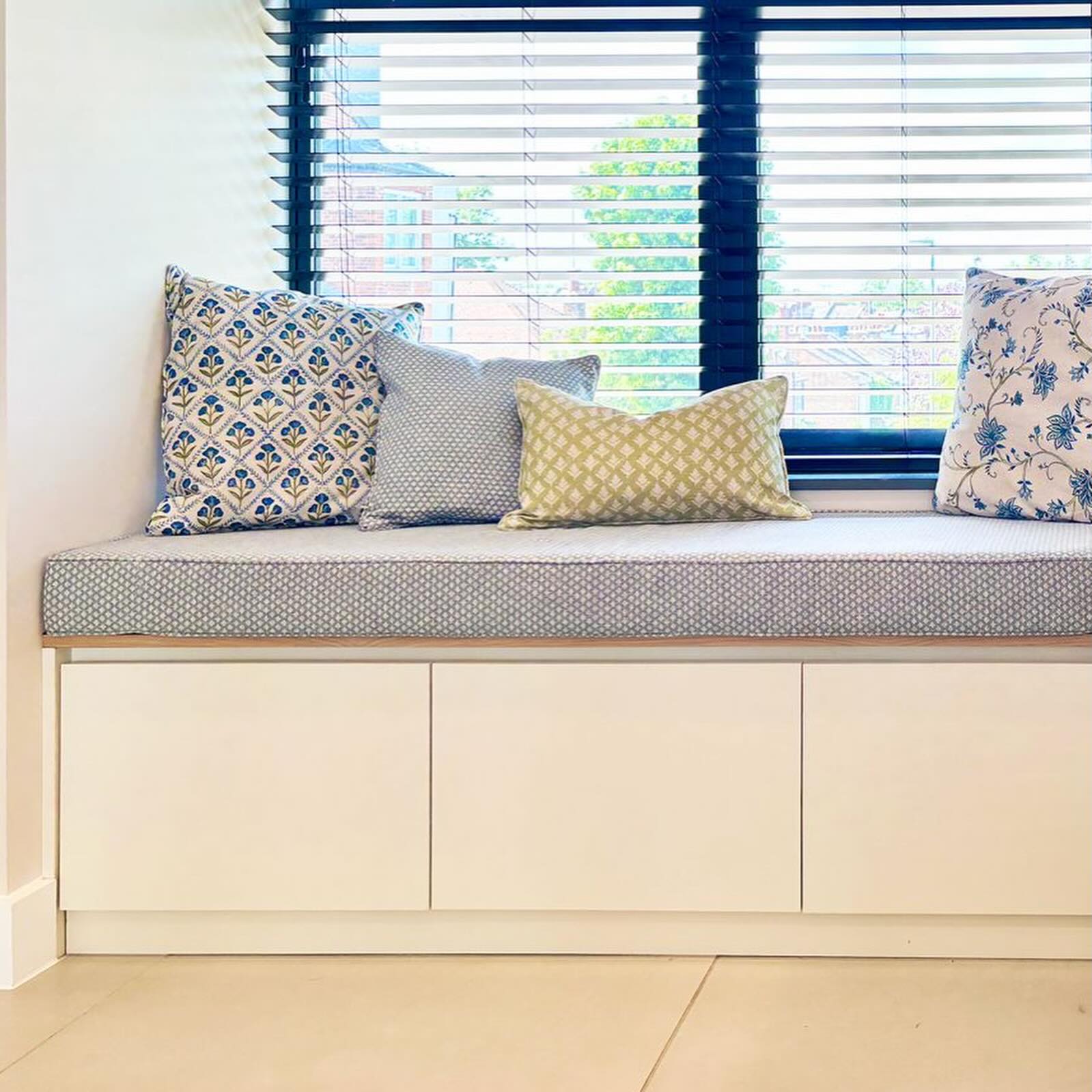 Muswell Hill house project. Bespoke carpentry - reading corner with coats wardrobe, lots of storage and even a corner for the family dog!