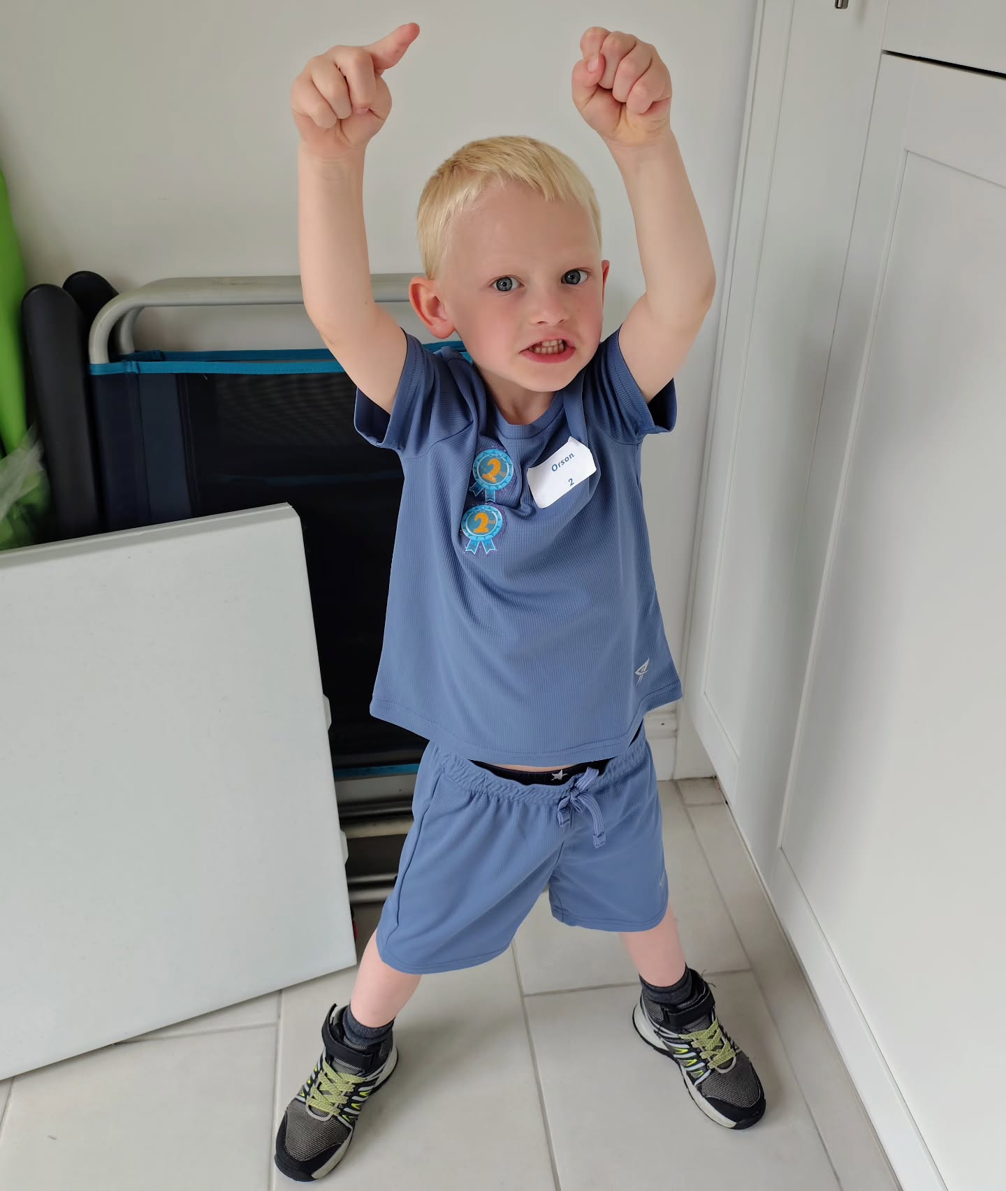 Two runner ups and a first place for the little man at sports day today!
CLEARLY has his dad's athletic prowess...obviously.
If anything I was TOO athletic in my youth...
Well done little man!
Folding camping table and chairs for effect.