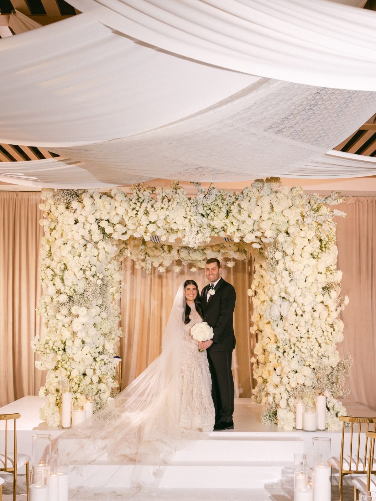 VALERIE & SEAN: an evening where timeless elegance met lush tropical romance—every detail thoughtfully curated to tell Valerie & Sean’s story in the most unforgettable way. 🌿
•
•
•
•Venue: @miamibeachedition
•Floral Production: @inesnaftalistudio
•Candles: @lennoxandgracecandles
•Lighting Draping: @psidgroup
•Welcome Tote Bags: @jycollective_
•Chocolates: @suzysweets24
•Furniture: @chromeeventfurnishing
•Table Top: @differentlookrentals
•Photographer: @psphotofilms
•Videography: @sendereyvideo
•Invitations: @invitorium
•Hair & Makeup: @theclyque
•DJ: @rockwithu
•Rabbi: @rabbimarkg
•Cigars: @miami_tobacco_traders
•Content Creator: @contentbff_
•Photo Booth: @capturepod
•After Party DJ: @djdannystern
•Balloons: @magiccityballoons
•Wedding Dresser: @anvbridalvalet
•Linens: @nuagedesignsinc
#luxurymiamiwedding #luxuryeventplanner #miamiweddingplanner #southfloridaweddingplanner