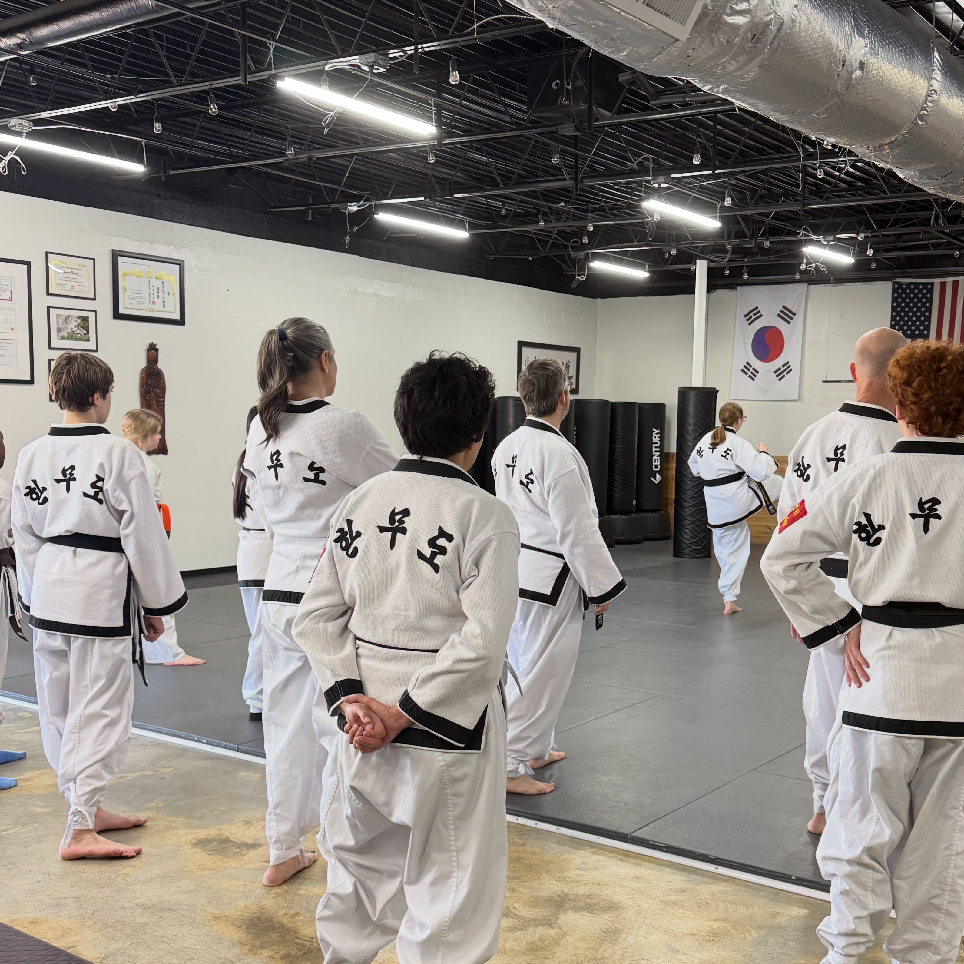 There is something special about watching a group of black belts quietly observing the training floor.
Years of practice have taught them that growth isn’t always found in movement. Sometimes it’s found in watching, studying, and preparing for the next opportunity to learn.
Black belt isn’t a destination. It’s a commitment to continue improving, to continue serving, and to continue being a student of the art.
At Harvest, our black belts help set the tone. They encourage younger students, support their training partners, and demonstrate what consistency looks like over time.
Leadership isn’t always loud.
Sometimes leadership is being present. Watching carefully. Staying engaged. And being ready when it’s your turn to step back onto the mat.
This is one of the beautiful things about martial arts. Every student is learning from every other student, and every generation helps elevate the next.
We’re proud of our Harvest black belts and the example they set every single day.
#Harvest #hanmudo #blackbelt #martialarts #growthmindset