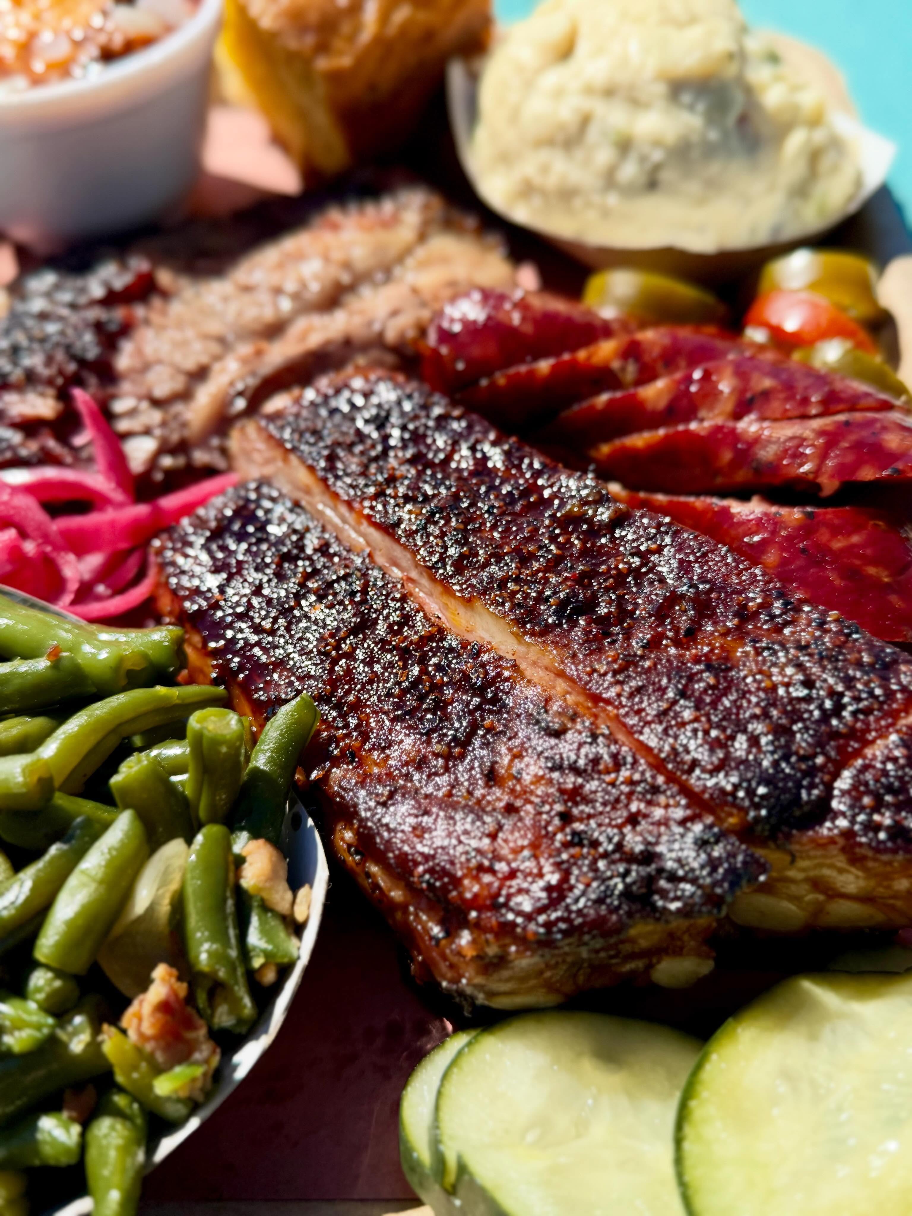 Father’s Day weekend starts now.
If Dad loves barbecue, don’t wait until Sunday. Bring him by this Friday or Saturday and let him start the weekend the right way—with smoked brisket, ribs, and all the Texas barbecue he can handle.