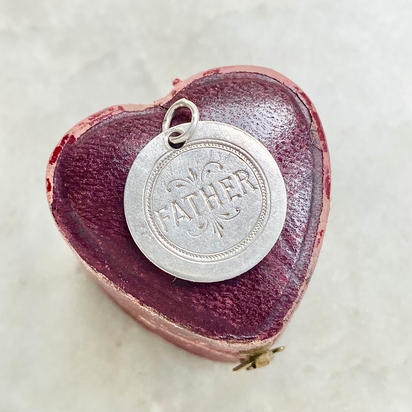 🪙 Over 130 years old, we’d love to know what this Victorian silver love token has seen and the stories it could tell 📖 A fitting piece for Father’s Day, the love token is made from a silver threepence coin that dates to between 1887 and 1893 and has been lovingly hand engraved to one side 🥹 Happy Father’s Day to all the father and father figures celebrating today 💕 And sending lots of love to those finding today a tricky one. We hope you’re having a wonderful day if you’re celebrating 🥰 If you’d like the full details on the love token it’s available via our website #kategoldcharms #lovetoken #fathersday #antiquelovetoken #victorianlovetoken
