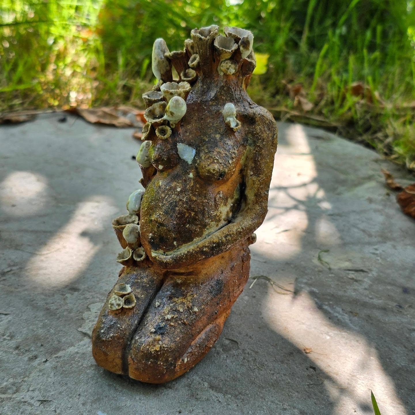 I've had this idea for some larger pieces in a series rattling around in my head for some time. I made a mini version of one of the ideas to fire in the last woodfiring, as a bit of inspiration and a push to finally start working on them. I think she came out quite lovely; I'll have to start working on her sisters.