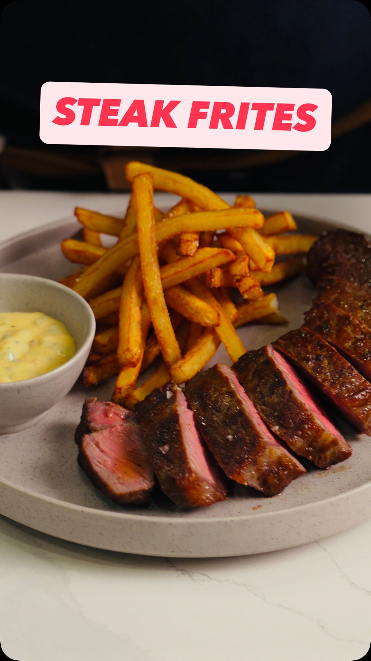 Steak Frites with Béarnaise Sauce
The perfect Steak Frites with a New York strip that satisfies indeed!! Follow the steps and make it recipe below 👇
Béarnaise Sauce
· 3 egg yolks
· 125 g unsalted butter, melted
· 1 shallot, finely diced
· 8–12 crushed peppercorns
· 1 tsp coriander seed, crushed
· 2 tbsp white wine vinegar
· 2 tbsp chopped tarragon leaves (+ stems for reduction)
· ¼ tsp Dijon mustard
· Salt and lemon juice to taste
Method
1. Reduce vinegar with shallots, peppercorns, coriander, and tarragon stems to ½ tbsp liquid. Cool.
2. Whisk yolks with 1 tbsp water, Dijon, and the reduction over low heat until thick (sabayon stage).
3. Slowly whisk in melted butter to form an emulsion.
4. Stir in chopped tarragon and reserved shallots. Adjust seasoning with salt and lemon juice.
Steak Frites
· 13½ oz (380 g) New York strip
· 4 large russet potatoes
· Peanut oil for frying
· Butter, herbs, Maldon salt
Method
1. Cut Frites by hand or in machine. Wash off starch. Pat dry. In a deep pan add the oil and heat up to 325F/160C and do the first cook (blanch) of the potatoes for 7-9 mins until soft and not coloured. Drain and set aside in the fridge.
2. Sear the steak flipping every 30-40 seconds (Heston Blumenthal method) for a deep crust in a pan. Cook to desired temp. Baste with butter and herbs. Let it rest a good 8 mins.
3. Meanwhile crisp up the fries in oil heated to 375F/190C for a couple minutes until golden brown.
4. Slice steak on the diagonal. Serve with crispy fries and lashings of Béarnaise.
Would you serve yours with Béarnaise or Peppercorn?