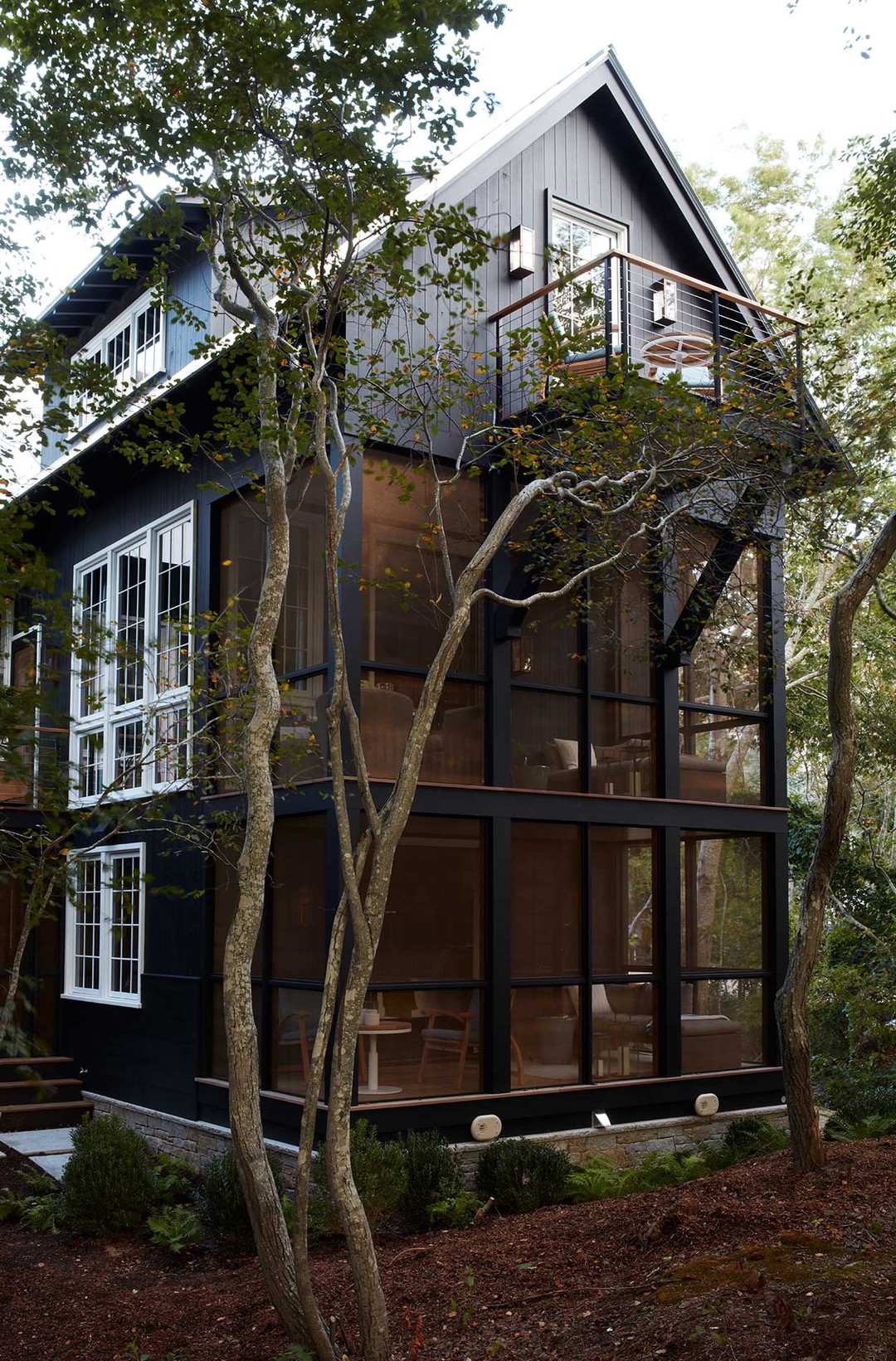 “Heaven in the Trees” lives up to its name.
Designed in collaboration with @rayboothdesign, these screened porches were built to feel fully connected to the surrounding landscape while offering the comfort, detail, and craftsmanship of a custom home. From quiet seating areas to a true sleeping porch, each space creates a refined transition between indoors and out.
Photography by @simonuptonphotos. Featured in @housebeautiful.
View our portfolio for more photos and to learn more about this special project.
#CapeAssociates #CustomHomeBuilder #CustomHomes #ScreenedPorch #SleepingPorch #PorchDesign #ArchitecturalDetails #CoastalHomes #NewEnglandHomes #LuxuryHomeBuilder #HomeDesign #Craftsmanship #HouseBeautiful #RayBoothDesign #SimonUptonPhotography