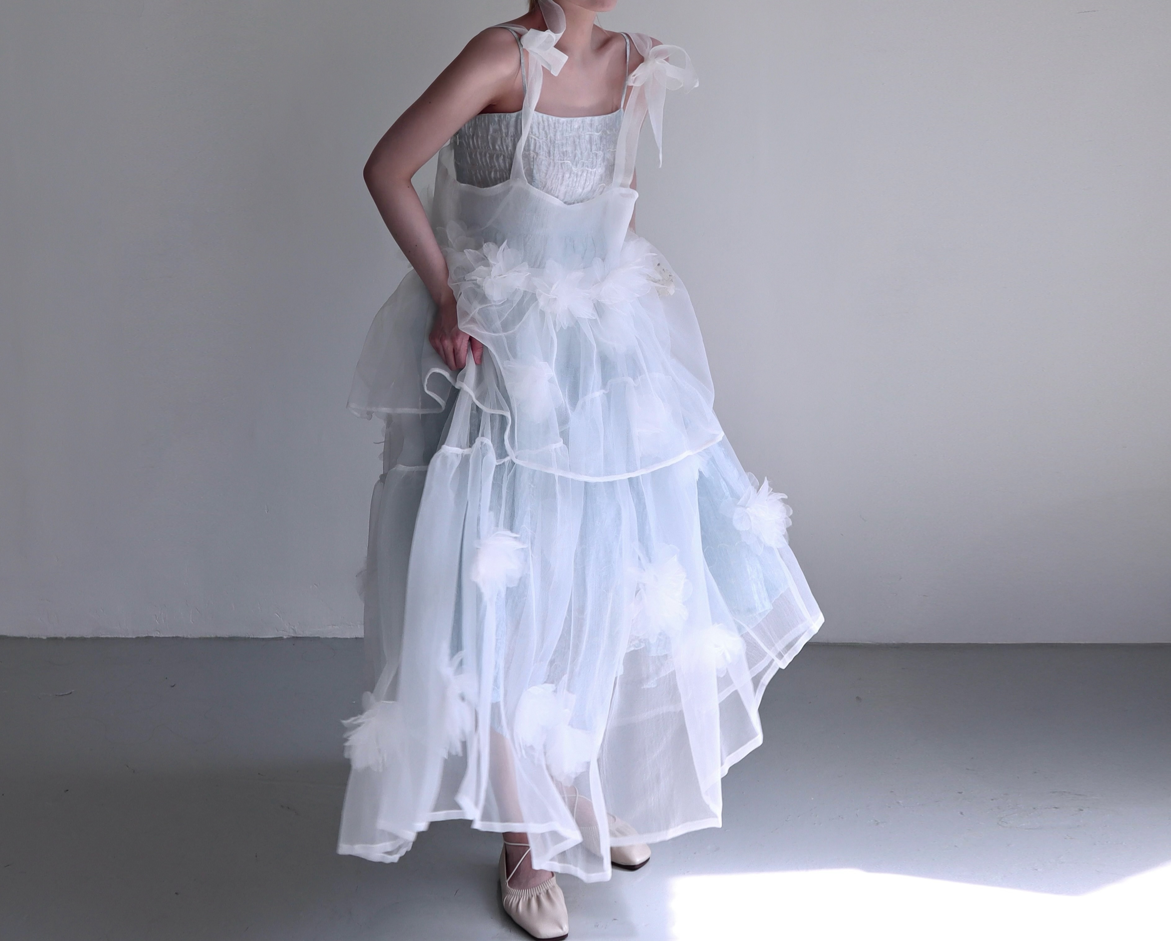 Bleu Bouffant Dress
White Aroma in Passing Vest
White Aroma in Passing Skirt