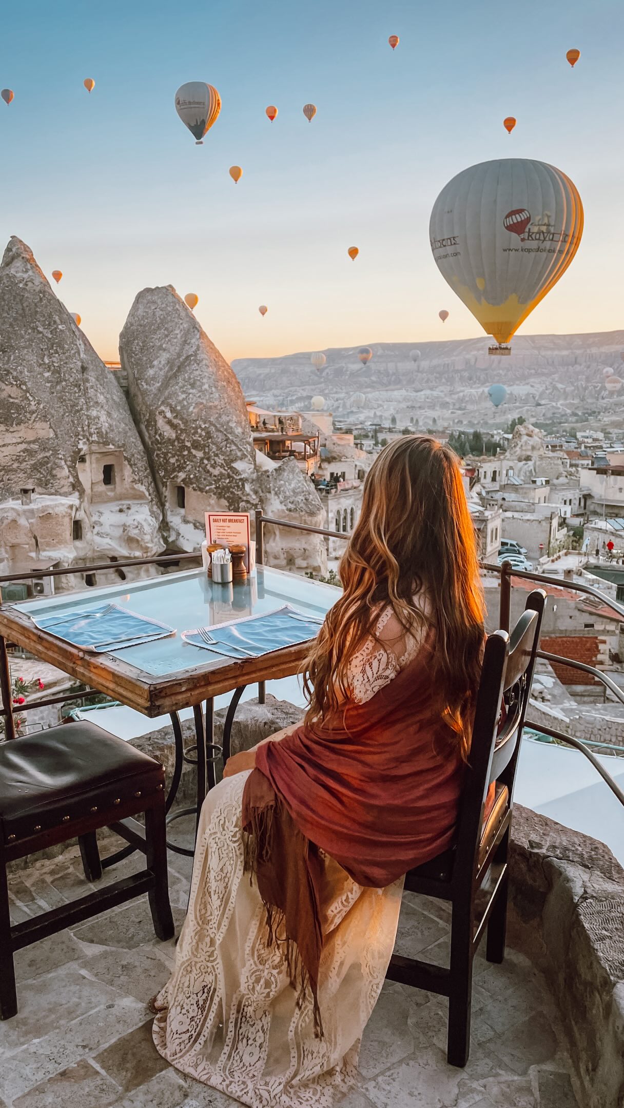This is your sign to take that trip to Cappadocia.
One of the coolest travel experiences I’ve ever had was waking up before sunrise and watching hundreds of hot air balloons float over Cappadocia. It’s one thing to see the photos online, but it’s completely different when you’re standing on a rooftop watching the sky fill with balloons right in front of you.
If seeing the balloons is a priority, stay in Göreme. Many of the cave hotels have rooftop terraces with excellent views, and you’ll be close to where most of the balloon activity takes place.
Balloons typically begin launching around sunrise, usually between 5:00–6:00 AM depending on the time of year. Flights operate most mornings, but they are weather dependent, so I always recommend spending at least a few nights in Cappadocia rather than planning around a single morning.
Yes it’s early… but TRUST me, it’s worth the early morning. Set your alarm and get your spot on a rooftop before sunrise. Even if you don’t take a balloon ride yourself, watching hundreds of balloons rise into the sky is an experience worth getting up for.
That said, if it’s within your budget, I highly recommend booking a balloon flight. Seeing the valleys, rock formations, and cave dwellings from above is a completely different perspective and one of the most memorable experiences I had in Turkey.
Ready to book your trip? I’ll help create your dream Turkey itinerary, including the best places to stay, tours, and experiences throughout the country. Link in bio✈️🇹🇷
#vacation #travelblogger #travelblog #traveltheworld #traveling #traveler #solotravel #sheisnotlost #traveltips #solofemaletraveler #travelinspiration #travelhacks #travelagent #traveladvisor #vacationplanning #travelplanner #travelagency #luxurytravel #travelagents #travelexpert #travel #dreamvacation #vacationplanner #traveldeeper #cappadocia #turkey #göreme #hotairballoon #kapadokya #cappadociaturkey