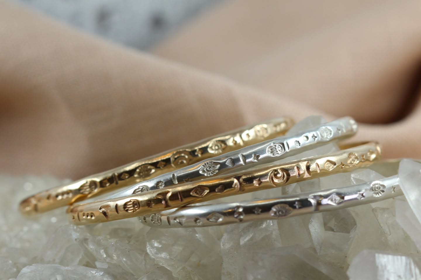 ✨ Slimline Mystic Menace Cuffs
Sometimes the simplest pieces become the ones you wear the most 🌙
These slimline Mystic Menace cuffs are designed as easy everyday talismans — lightweight, symbolic, and effortless to stack or wear alone.
Each one is individually patterned and adorned with:
👁 Evil Eye — protection
🪬 Hamsa Hand — blessing & guidance
🌙 Crescent Moon — intuition & cycles
Available in sterling silver or 14k gold fill, with every cuff carrying its own unique finish and energy ✨
The kind of jewellery you forget you’re wearing… until you catch it in the light and remember why you chose it 🤍
#MysticMenace #CuffBracelet #SymbolicJewellery #HandmadeJewelleryUK #JewelleryWithMeaning