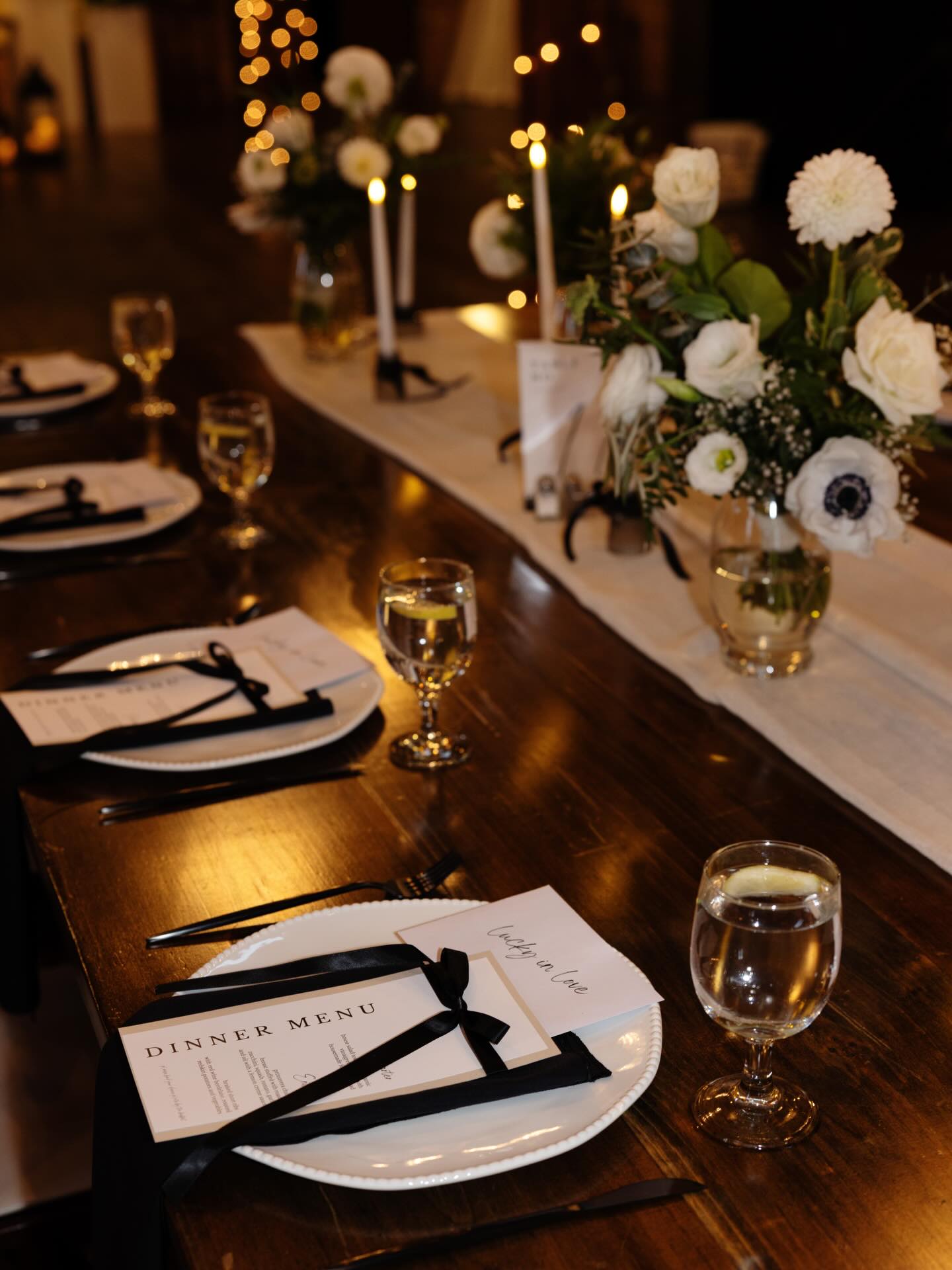 Here to say, details matter🤍🖤 The cutesy bows, the candlelit centerpieces, and lush greens & florals make the most beautiful decor. The black & white theme throughout is giving elegant & timeless wedding✨
Photographer: @janaerosephotography
Coordinator: @alisamarie.co_saraf with @alisamarie.co
Florist: @pollinateandpop
Caterer: @tfbcatering
DJ & Photo Booth: @completewedo
Makeup: @_blendbeautybar_
Chandeliers: @strayproductionservices
Couple: @kenz_kondra & @adamkondraskiakaak