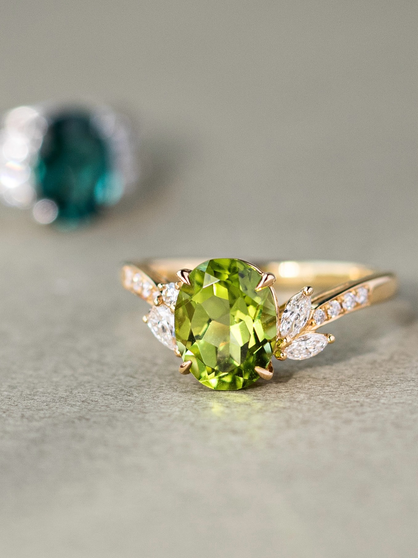 Summer finds its colour in #Peridot.
Fresh, vibrant, and full of light, the Flore Ring showcases an oval-cut peridot embraced by nature-inspired diamond details. Delicate marquise and brilliant-cut diamonds bloom along the band, creating a design that feels both graceful and effortlessly wearable.
Discover the Flore Ring at our Ann Siang Hill Boutique and enjoy our limited time Summer Specials promotion from now till 28 Jun.