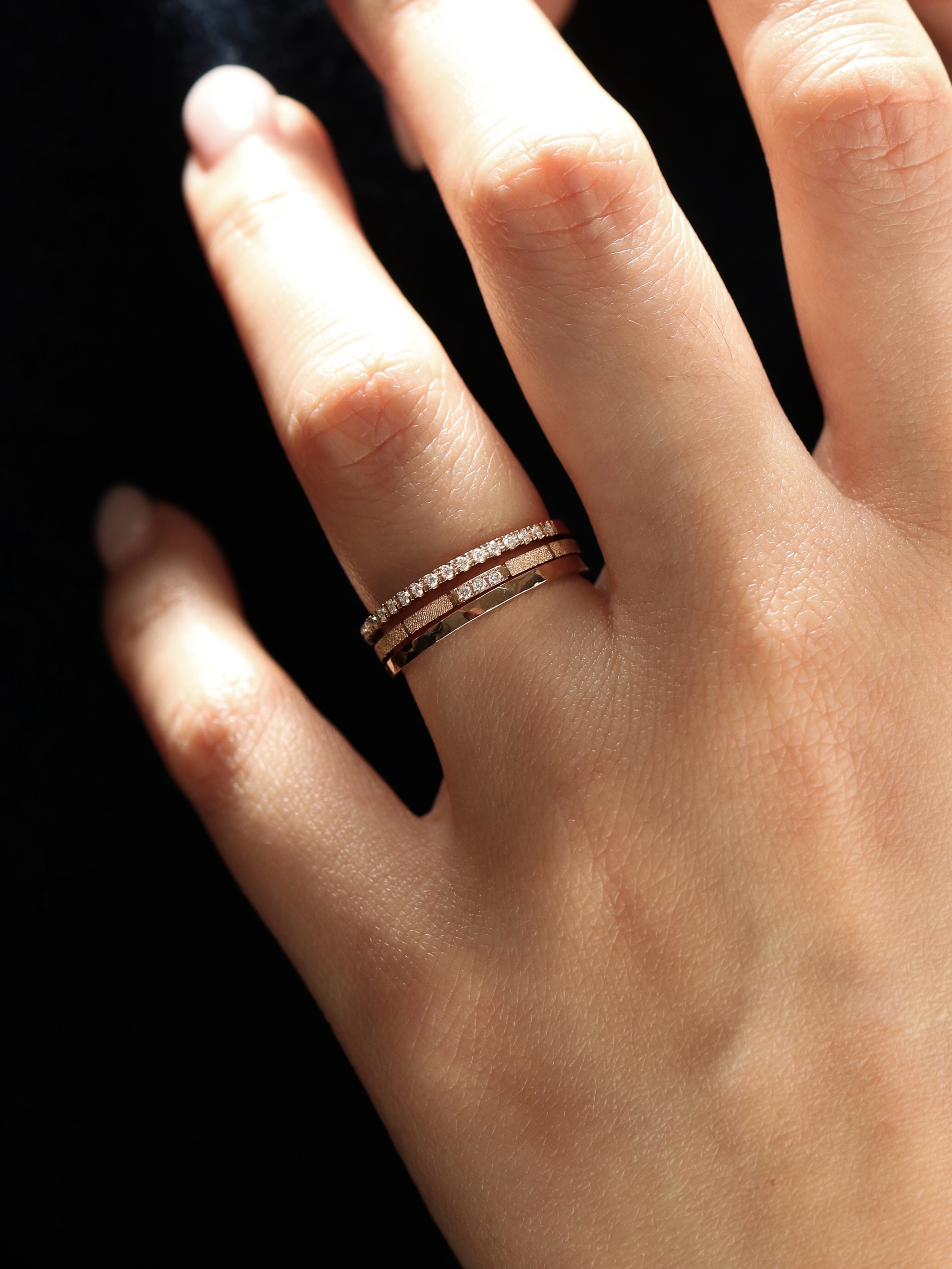 The beauty of Linea lies in its simplicity.
Six distinct finishes. Endless ways to stack, layer, and make it your own.
Crafted in Japan from 18-karat Champagne Gold using our signature Tanzo forging technique, each ring is designed to become part of your everyday—whether worn alone as a quiet statement or stacked to tell your own story.
Available exclusively at our Ann Siang Hill Boutique. Visit us to discover the collection in person and find the combination that feels uniquely yours.