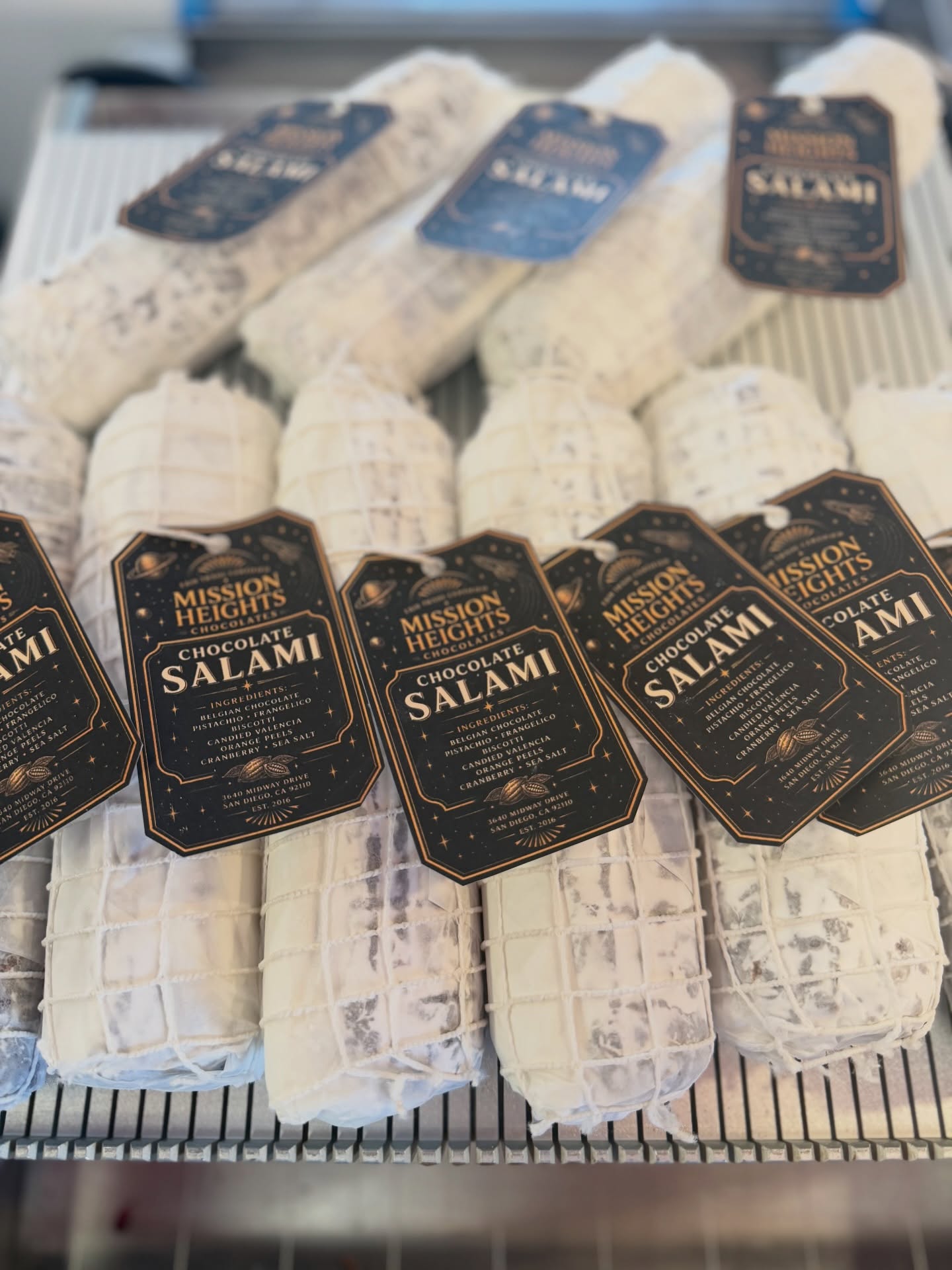 Our best seller chocolate salami containing Belgian chocolate,Biscotti, candied, Valencia oranges ,cranberry and frangelico pistachio