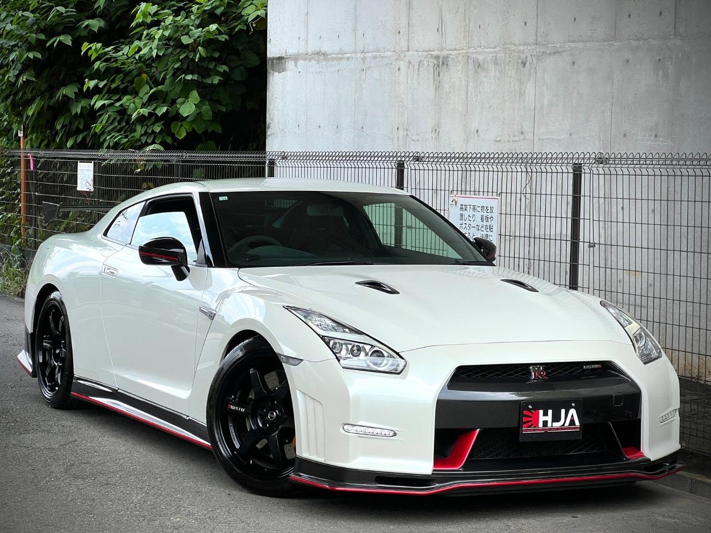 ARRIVING SOON – HJA
10/2014 Nissan GT-R NISMO
31,615km / approx. 19,644 miles
QAB Pearl White
Optional NISMO Titanium Exhaust
Original paint
HJA are delighted to offer this rare MY14 Nissan GT-R NISMO, now secured and currently arriving from Japan.
Finished in QAB Pearl White, this example has covered just 31,615km / approximately 19,644 miles from new and comes complete with its maintenance log, record book, warranty booklet, instruction manual and two smart keys.
This example also benefits from the highly desirable optional NISMO titanium exhaust, an extremely expensive and sought-after factory option that is very hard to find.
This is a very clean and well-documented GT-R NISMO, with no accident history and reported no hard or track use. We have also checked the vehicle with a paint meter, with the metal panels showing factory paint thickness. As expected, plastic panels cannot be accurately checked with a paint meter, although they also appear to retain their factory paint.
The car has clearly been maintained to a very high standard in Japan and also benefits from Upline ECM 324SP Version 4 software, MY20 TCM data, transmission solenoid cleaning, differential oil replacement and flywheel housing assembly replacement.
Additional Information:
• Optional NISMO titanium exhaust
• Metal panels show factory paint thickness
• Plastic panels appear to retain factory paint
• No accident history
• Reported no hard or track use
• Maintenance log and record book included
• Warranty booklet and instruction manual included
• Two smart keys
• Upline ECM 324SP Version 4
• MY20 TCM data
• Transmission solenoid cleaning carried out
• Front and rear differential oil replaced
• Flywheel housing assembly replaced
• XPEL front-end paint protection film
• BOSE sound system
• NISMO floor mats
• Colour rear-view monitor
• Built-in ETC
• TV kit
Clean Japanese examples are becoming increasingly difficult to source. This vehicle will be supplied UK-registered and ready for the road, with all necessary UK conversions completed to HJA’s usual high standard.
Secure now with a 10% deposit until ready for collection.
#nismo #nissangtr #jdm #nismogtr #r35gtr