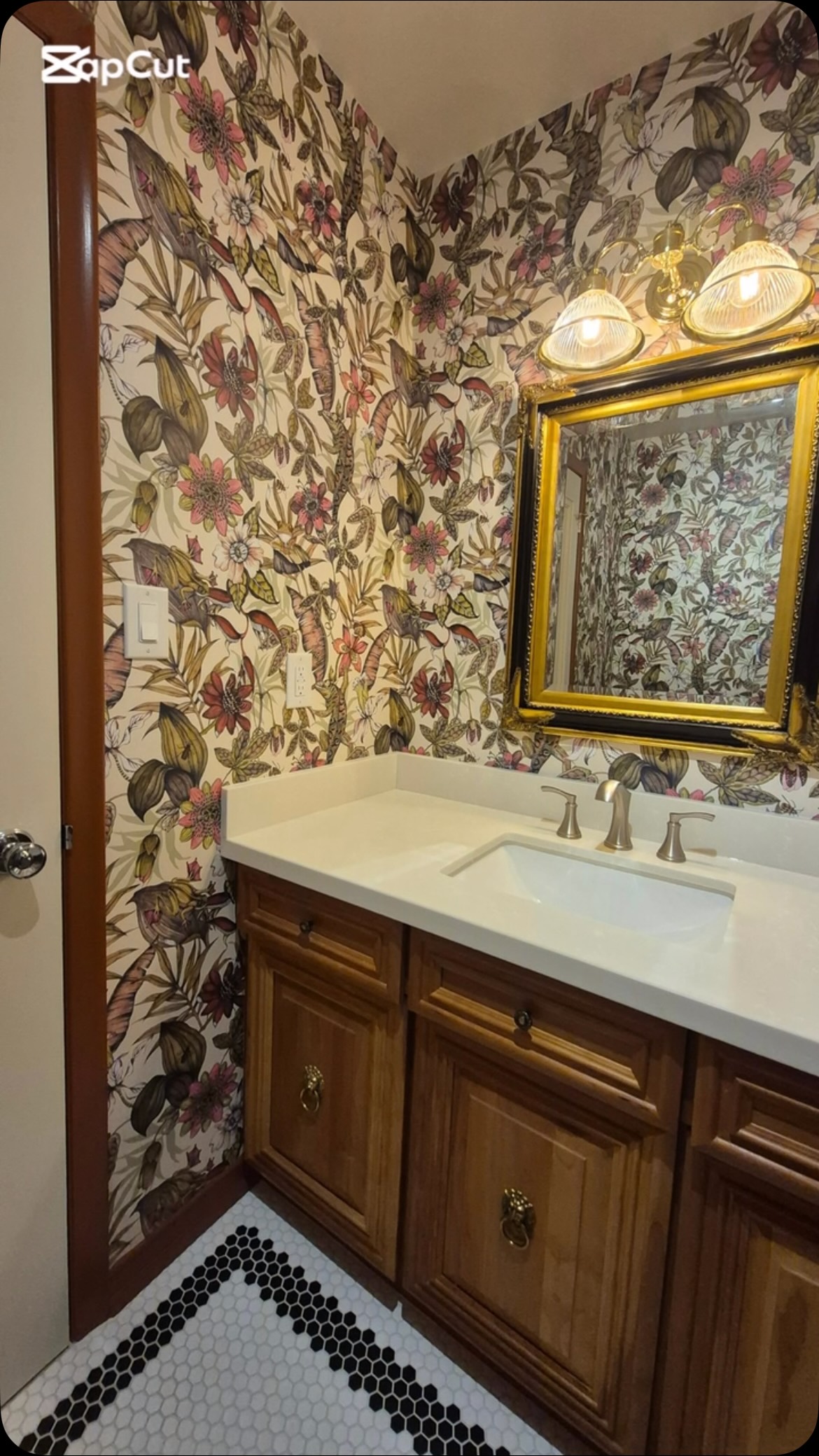 It’s a jungle in the Clients powder room now. Go with both Wallpaper in a powder room don’t be afraid and coordinate the paint colour on the trim and door.