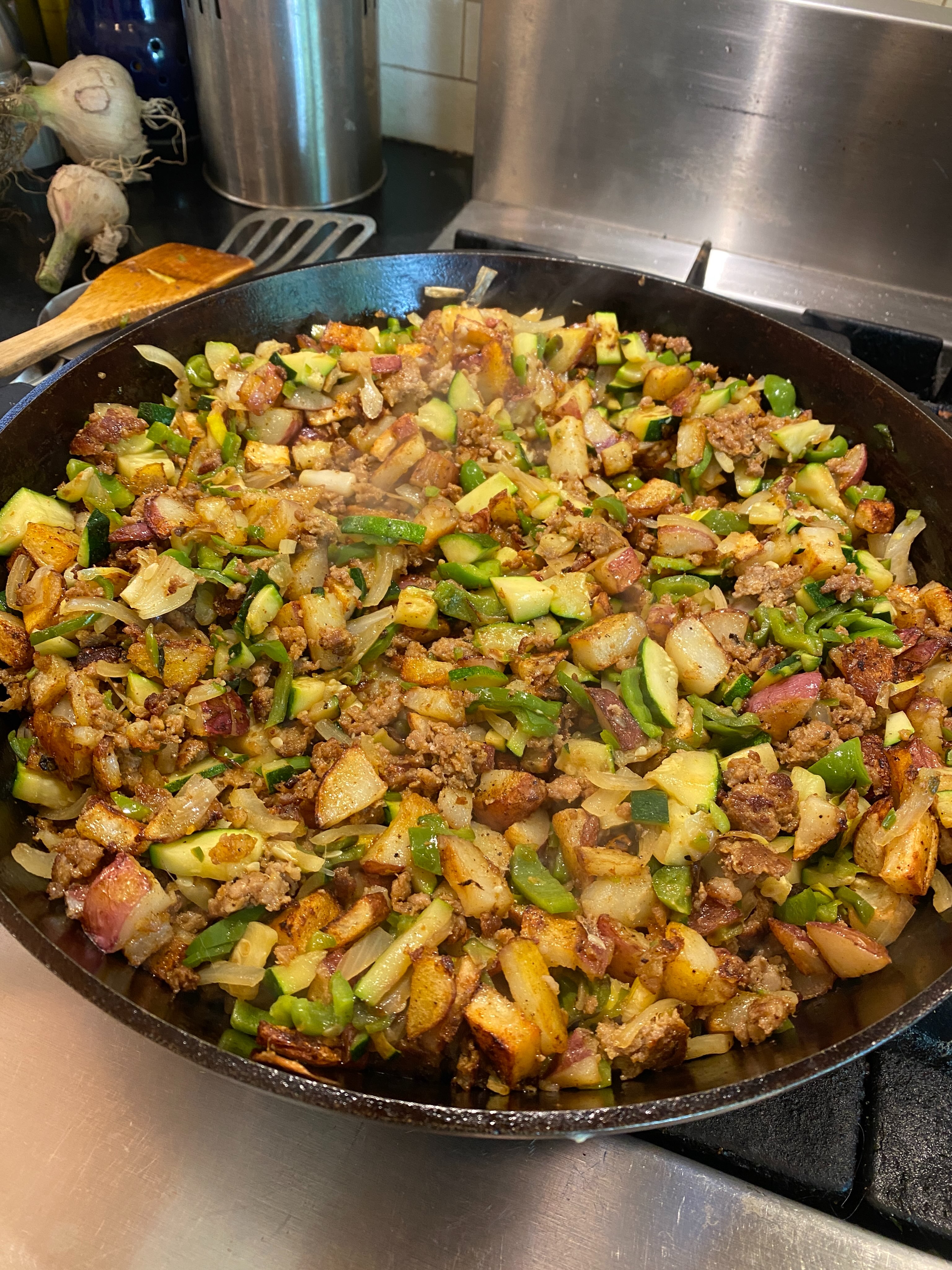 Farm breakfast hash:
New potatoes
Homemade chorizo
Onions
Bell pepper
Garlic
Zucchini
Serve with sour cream, cheese, salsa, avocado and an over easy egg