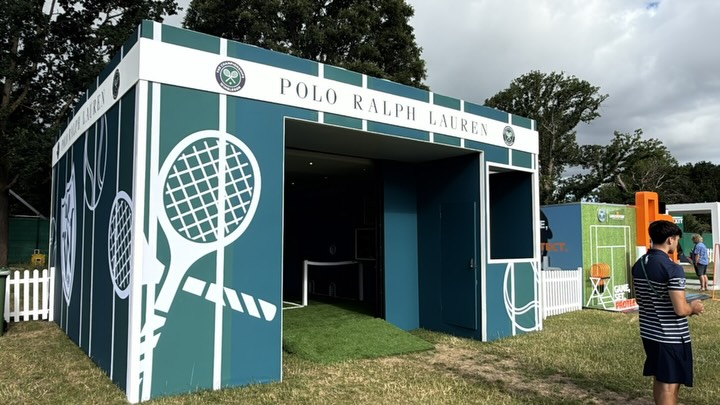 As the gates open for the first day of @wimbledon, we’re proud to see another PVE Live brand experience come to life 🎾
Working with @ralphlauren, we designed, manufactured and delivered this premium activation, built around an @airclad XPO6 structure with bespoke external cladding to create a striking, fully branded visitor experience.
The activation celebrates the ball boys and girls, proudly outfitted by Ralph Lauren throughout the Championships.
Featuring premium printed graphics, interactive challenges, custom flooring and high-end finishes throughout, every detail was designed to deliver a seamless brand experience.
A huge thank you to everyone involved in bringing this project to life. We can’t wait to see fans enjoying the space over the next two weeks.
#ProvisionEvents #Wimbledon #RalphLauren #ExperientialMarketing #BrandExperience