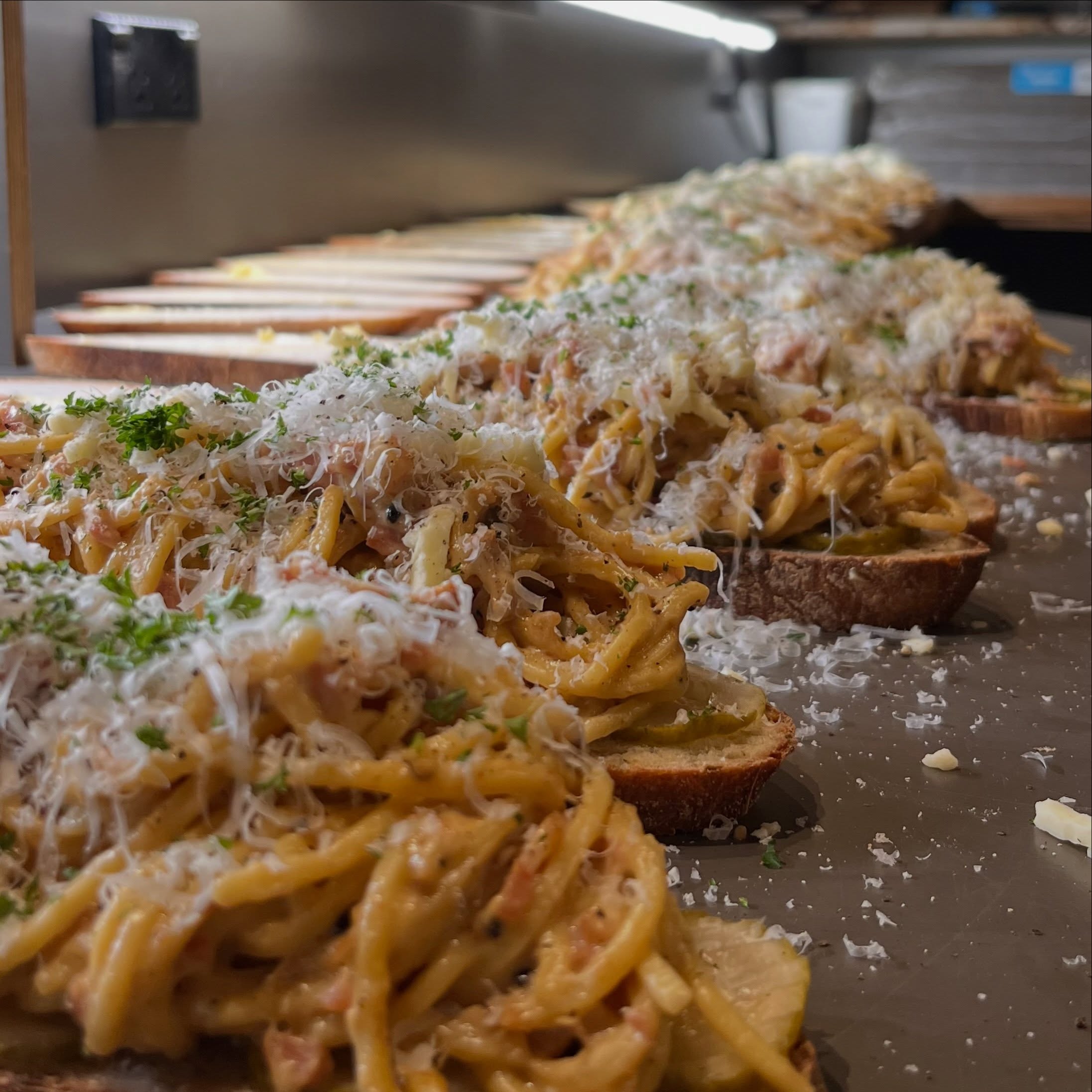 Is that a line up of carbonara artfully arranged on sourdough bread we hear you ask?
Could that be McClures sweet & spicy pickles nestled underneath rich crispy bacon parmesan dusted spaghetti?
What kind of genius inspires such a delicious carbohydrate laden combination?
Well… we will give you a hint. It happens but once a year, and it involves toasting bread.
#toastietakeover