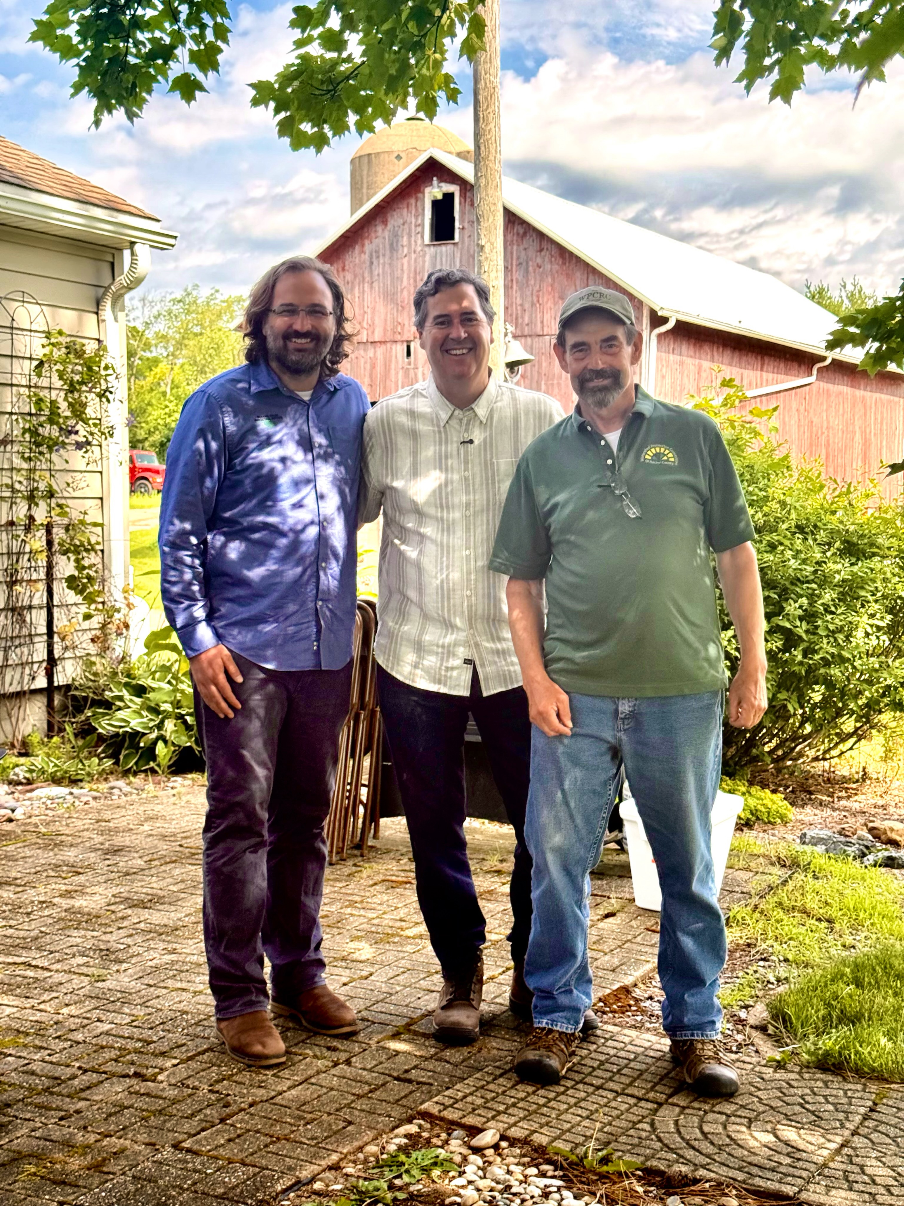 It’s hard to imagine three more enthusiastic policy wonks than these guys. As part of our ongoing Candidate Education Summer Farm Tour, MFAI Policy Director Chuck Anderas facilitated a discussion last week between Wisconsin gubernatorial candidate Joel Brennan and our farm neighbor and frequent collaborator Jim Stute. Jim is a row crop farmer, a researcher, and certified crop advisor.
Before we could even introduce Joel’s staff or son Connor to Jim at his farmhouse, they jumped into a far-ranging and highly detailed conversation about both federal and state ag policy.
When we were able to interrupt them, we all jumped into the truck and gator and headed to Jim’s research plots where he has been trialing no-till and cover crop practices for many years. At high noon in the middle of a heat advisory, this bunch was completely engaged for several hours.
“This was a particularly interesting Candidate Education visit because Jim is extremely knowledgeable about the impacts of both federal and state policy on farmers’ lives and bottom lines,” said MFAI Advancement Director Kriss Marion, who documented the conversation. “We knew this was going to be a good pairing, because Jim is a policy wonk and so is Joel - having staffed federal legislators in DC and Governor Evers in Madison. They got very in-depth about specific ways Wisconsin policy could help Wisconsin farmers.”
After the tour, the group settled around a table in the shade by the farmhouse and Jim pulled out a computer to show Joel ten years of results from farmer cover crop trials. This is why we love to get legislators out on farms with our regenerative partners.