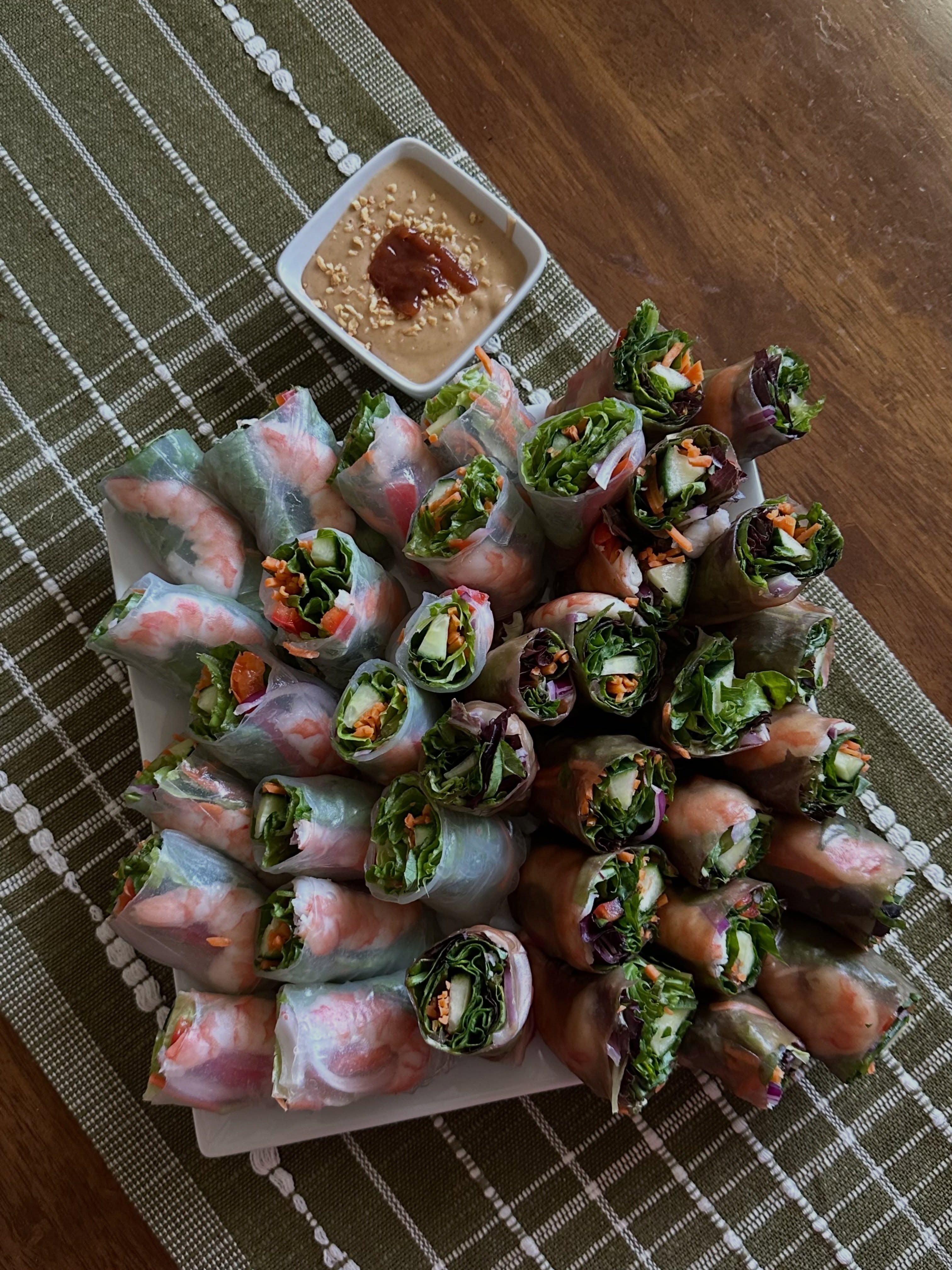 Fresh, colorful, and full of flavor. 🌿🦐
Our shrimp spring rolls were wrapped in both white and brown rice paper, packed with crisp vegetables and herbs, then served with our signature creamy peanut dipping sauce. A light and refreshing addition to our Fourth of July table. 🇺🇸✨
#HarmonyHomeCollective #FreshSpringRolls #RicePaperRolls #FourthOfJuly #HealthyEntertaining