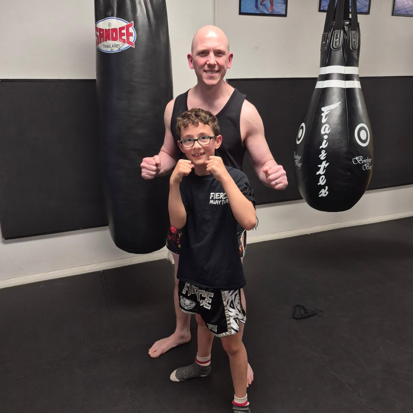 👏🏼 BIG well done to our Fierce Junior's who received Pra Jiads recently, blue 💙 for ONE year, black 🖤 for TWO years, red ❤️ for THREE years commitment to training, and red and black ❤️🖤 for their first interclub 👊🏻
What is the Pra Jiad?
Muay Thai fighters wear fabric armbands known as Pra Jiad. Pra Jiads are believed to grant good luck to the wearers with origins tied to the ancient times when the country was constantly at war. The armbands were usually fabric torn off a mother's dress and tied around the arms. The symbolic act represented a mother's blessing for the safety of the wearer.
Worn on one or both arms, they are now made with fabric, rope or a combination of both materials.
Pra Jiads are looked upon as sacred objects and should be treated with respect at all times. They are handled with care and must never be dropped, stepped on or over. The traditions of Muay Thai are what make the sport distinctive and special - it is truly one of the most enchanting combat arts in the world.
#commitment #muaythailife #muaythaikids #FierceFamily #fareham