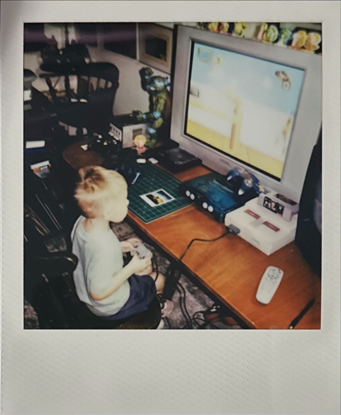 My grandson Ollie playing Toy Story on the Super Nintendo and Playing the Original Mario Bros on the NES. He’s actually not that bad ha ha.
#polaroid #retrogaming #photography #retro #gaming