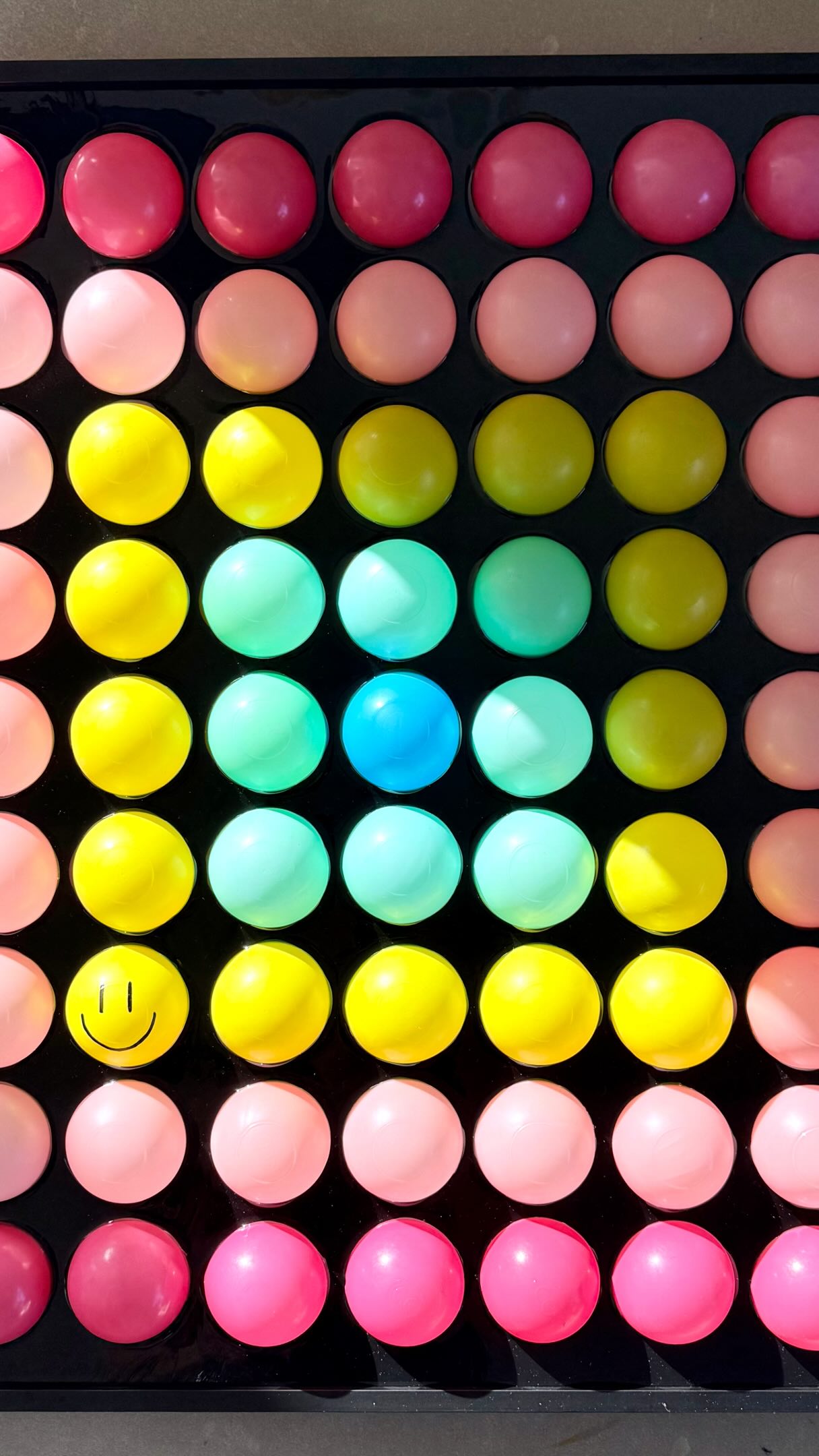 From the chaos of the ball pit…
to a slower kind of joy.
There’s something soothing to me about turning all these little colourful balls into art.
It quiets my mind while making me happy at the same time.
A tiny moment of play, order and peace. It’s made for my brain.
Sorting them. Placing them. Letting colour find its rhythm.
I hope it brings a little of that feeling to the end of your day watching it.
‘Happy ball’
60cm x 60cm
Preloved ball pit balls, resin on a LED panel. Metal frame
Currently exhibited in Marylebone.
Viewing on request.
#katvandal #ballpit #toyart #ballart #happyart