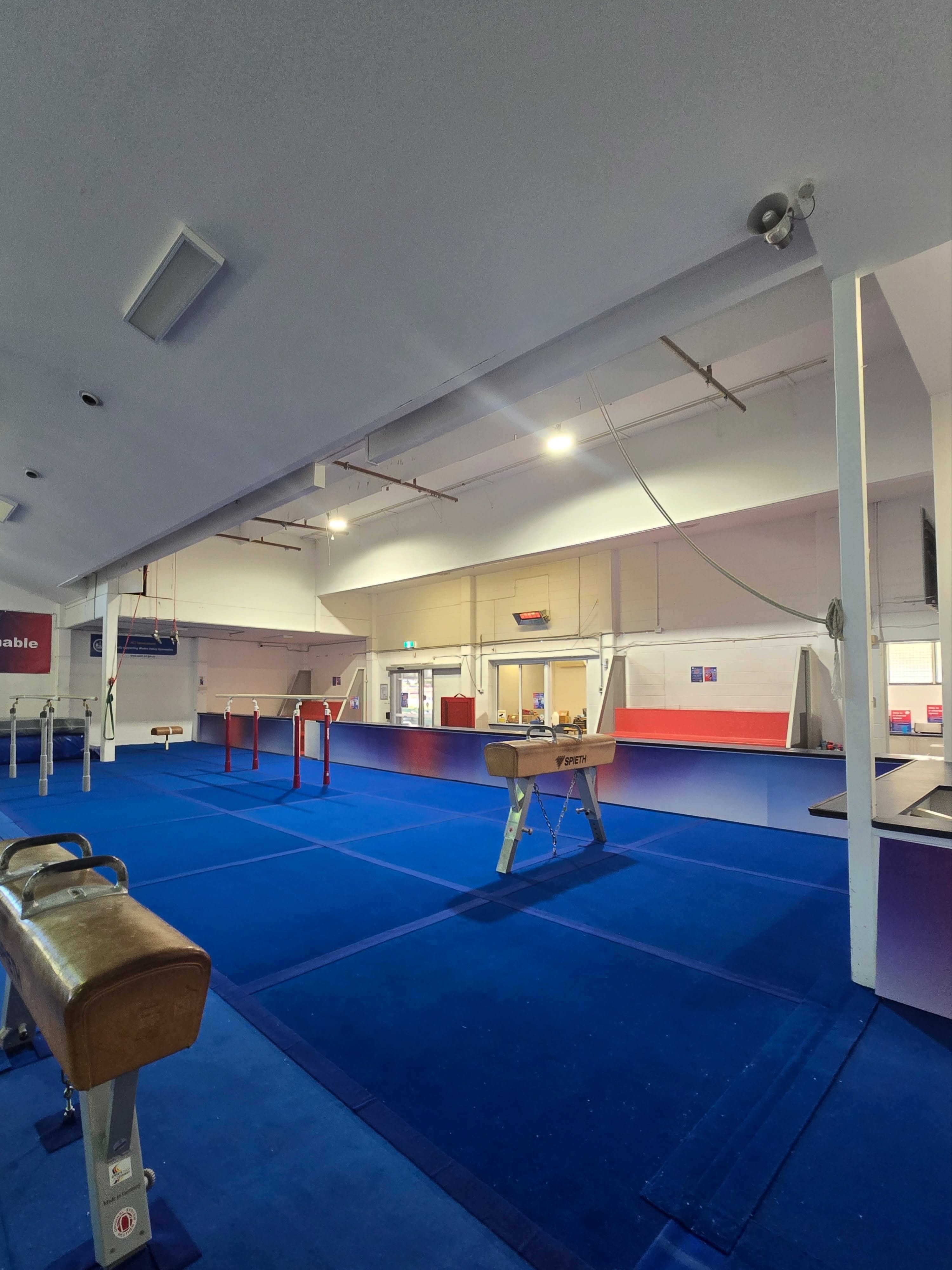 🔧 A huge start to the school holidays behind the scenes at Woden Valley Gymnastics Club!
While our busy Holiday Program was running each day, our Management Team and Program Coordinators were hard at work completing a major upgrade to our MAG Pommel and Parallel Bars area, with the fantastic support of Novo Active @novoactive
Over three busy days we:
🔹 Removed the existing foam panels
🔹 Repurposed those panels to upgrade other areas at the back of the gym
🔹 Installed our brand new TaiShan Parallel Bars
🔹 Precisely cut and fitted new foam panels around the equipment feet for a perfect finish
🔹 Transformed the wall with a fun new design to brighten the space
A massive thank you to everyone who pitched in to make this project happen while keeping everything running smoothly. Your hard work has created an even better training environment for our athletes.
A special shout-out to Jeremy, who generously stayed back after hours to help despite only just returning from competing at the Australian National Championships. Your dedication and commitment to the club are truly appreciated!
We can’t wait for our MAG athletes to enjoy the upgraded space! ❤️🤍💙
#WodenValleyGymnasticsClub #MAG #Gymnastics #Canberra #CommunitySport