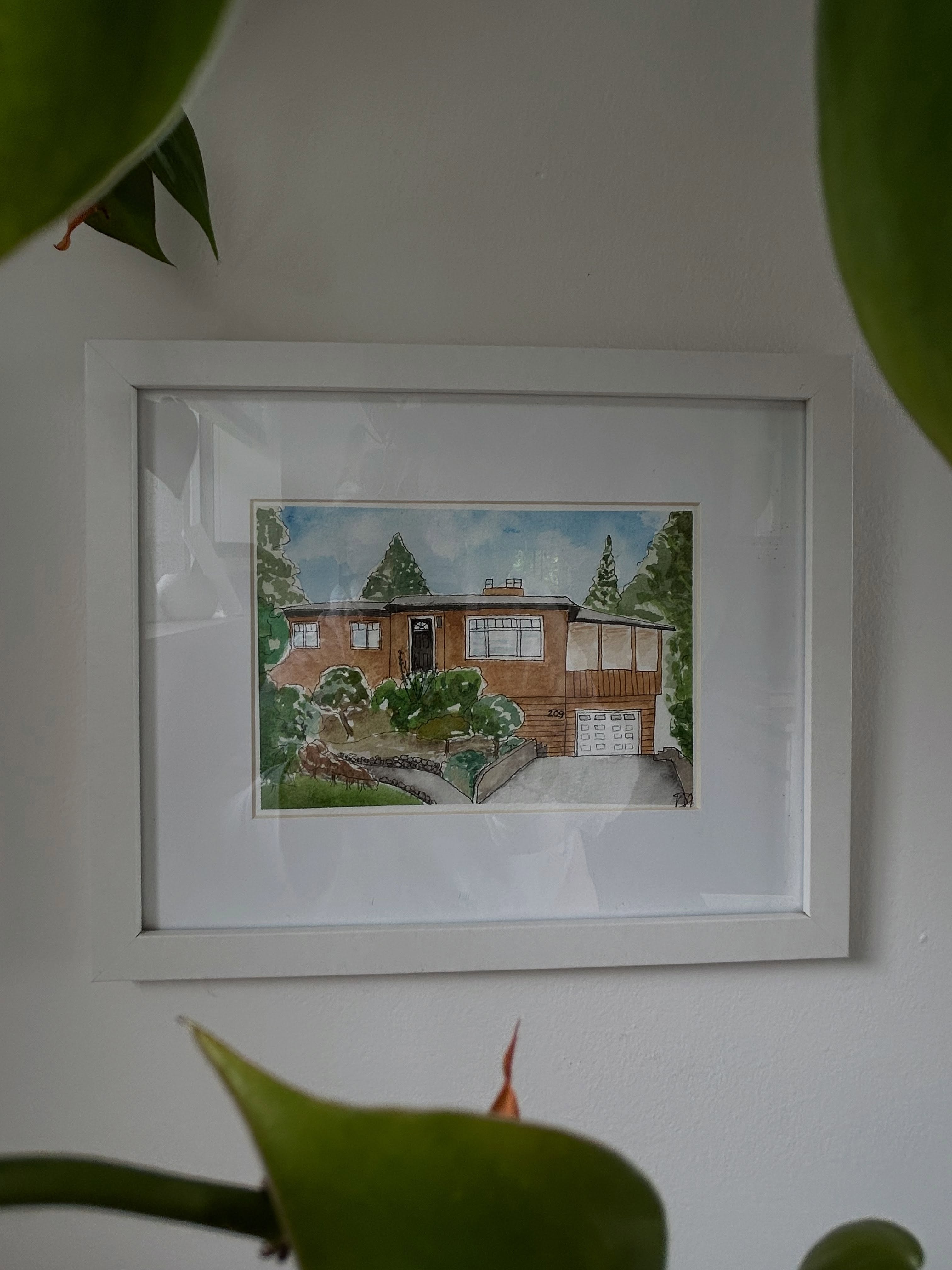 🏡 💛 Another cutie house painting in the books. This time for a family moving on after 15 years in this home! Swipe to see the evolution from pencil sketch to finished painting. #watercolourpainting #houseportrait #vancouverhomes #homesweethome