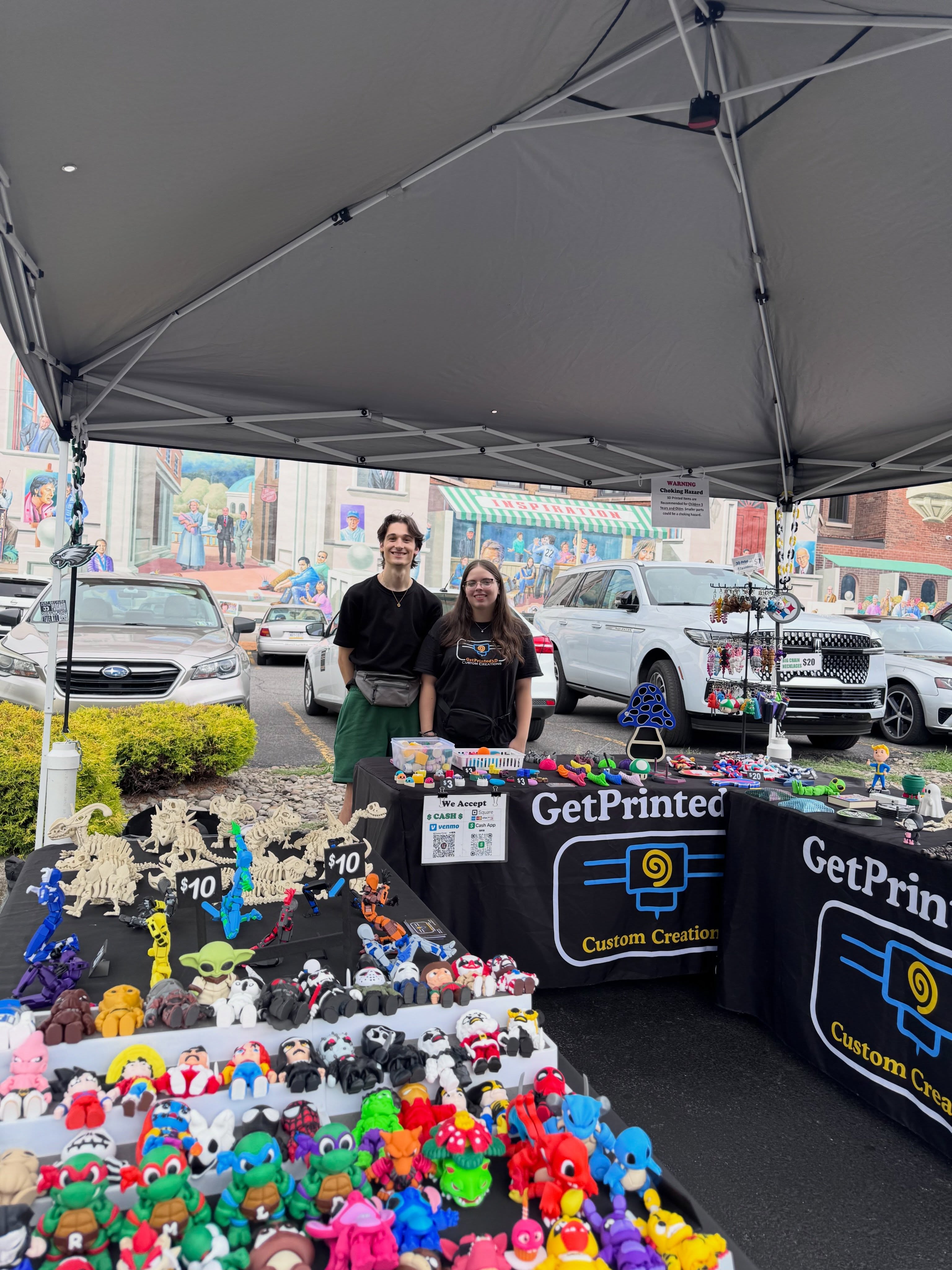 Despite another round of threatening weather, Downtown Pittston came alive last night for another Second Friday Art Walk! While the forecast kept our vendor lineup smaller than usual, our talented artists showed up, and so did our incredible community.
Visitors spent the evening supporting local creatives, exploring downtown businesses, and enjoying everything that makes Pittston such a vibrant place to be. Thank you to everyone who braved the weather to shop small and celebrate the arts with us.
We’ll take a little break for the Tomato Festival before returning with our next Second Friday Art Walk in September. We can’t wait to welcome everyone back for another evening of art, community, and downtown fun!