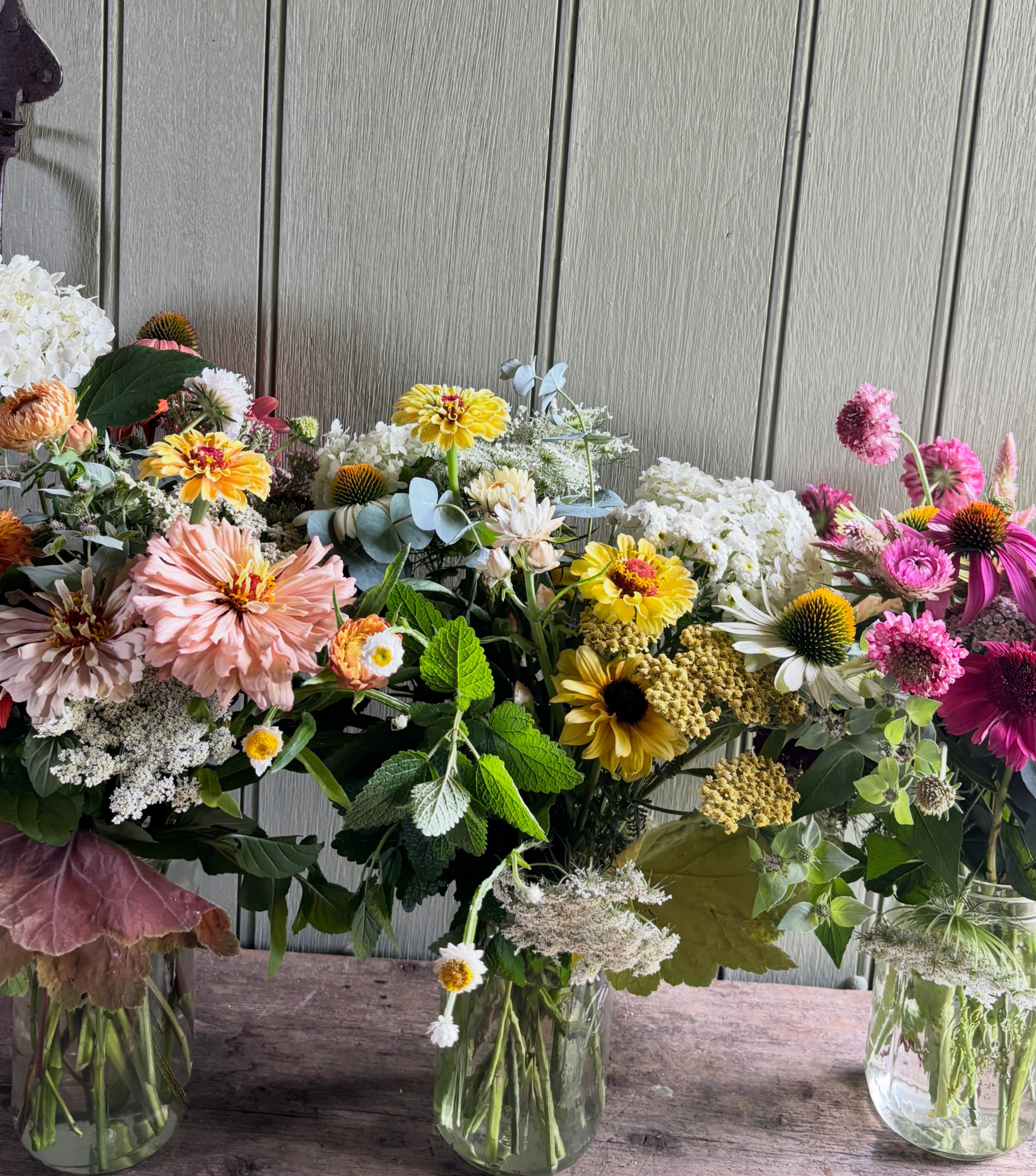 Fragrant Florals offer the best of what's growing- gathered in monochromatic palettes that please and scents that stimulate your mind. (Wow, that's a lot for a bouquet, right?) Each bunch is arranged in a glass jar for easy gifting (and transporting).
If you were a fan of scratch 'n sniff stickers mid-eighties, this is the bouquet for you.
You can specify which scent you prefer, or allow me to cut what looks best in the garden.
Options:
Florist Choice: I will make you something pretty and fragrant
Strawberry Soiree: Mixed pink and berry hues with a Strawberry scent
Clementine on my Mind: Shades of orange, peach and rust with a citrus scent
Lemoncello Fellow: Yellow (and white) florals with a fresh, fragrant Lemon scent
Apple of my Eye: Gathered green foliage and flowers with a distinct Apple aroma
Mint to Be: Purple and blue florals with mixed minty perfume
Have something else in mind? Reach out and run it past me...I love to dream up fun fragrant combinations. Have a childhood memory you want to capture in scent? We can try that!
Cut-to-order, each bunch is unique and fresh for you.
Once your order is placed and confirmed, I will hand select and gather your flowers for pick up.
Please allow 24-48-hour advance notice for all pick up bouquets. I have to cut, condition, and gather your florals.
I do not let flowers sit out in the heat they do not like that (and it shortens their lifespan) and I prefer to NOT cut flowers mid-day while the Summer heat is on.
Pick up at Floriculture Micro Farm
Visit the Website->Shop->Flowers->Fragrant Florals to order or message me here or text 443-813-0229
Want to make a day of it? Book a Sensory Garden Walk and add on a Bouquet to take home.