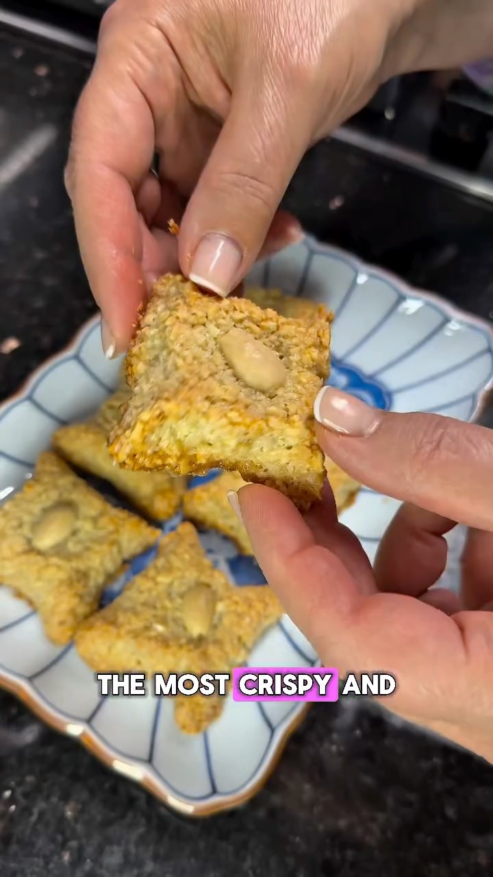 🌸 Massafan – Almond Cardamom Cookies
Ingredients
• 200 g finely chopped almonds (not ground into flour — small texture is ideal)
• 80–100 g granulated sugar (adjust to taste; 90 g is perfectly balanced)
• 1 tsp ground cardamom
• 2 large egg whites
• rosewater (for shaping)
• Whole almonds (for garnish)
Instructions
Preheat oven to 175°C (345°F). Line a baking tray with parchment paper.
In a bowl, combine chopped almonds, sugar, and cardamom.
Add egg whites and . Mix until a sticky but cohesive dough forms.
If the mixture feels too loose, let it rest for 5–10 minutes so the almonds absorb moisture.
Pour a small amount of rosewater into a shallow dish. Lightly moisten your hands.
Roll small portions (about 1 tablespoon each) into smooth balls.
Gently flatten slightly.
Pinch the edges 4–5 times to form a rustic star shape.
Press a whole almond firmly into the center. Bake for 12–15 minutes, until lightly golden.
Cool completely on the tray — they firm up as they cool.
#almondcookie #cardamon #rosewater #iraqifood #foodlover