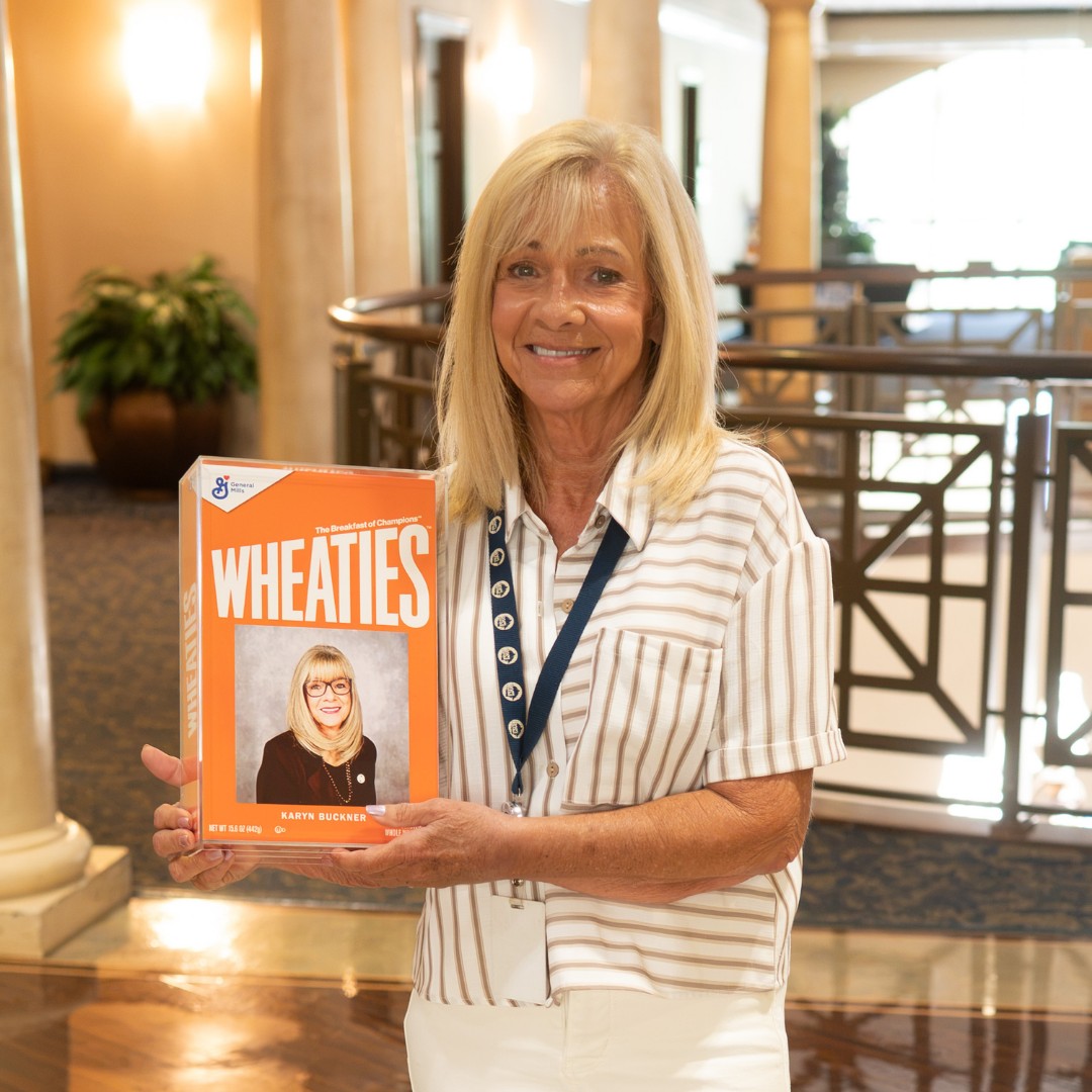 Congratulations to Karyn Buckner on receiving a personalized Wheaties "Breakfast of Champions" cereal box from General Mills in recognition of her outstanding dedication, leadership, and commitment to supporting school nutrition programs across Region 8.
The presentation was made by Sabrina Sivongxay, Account Executive with General Mills North America Foodservice. Karyn's commemorative box is a replica of the original that will be permanently displayed in the Wheaties Hall of Fame at General Mills headquarters in Golden Valley, Minnesota, alongside boxes honoring professional athletes, Olympians, and other distinguished champions.
Karyn, thank you for your outstanding dedication to supporting schools and school nutrition across our region. This recognition is a testament to the impact you make each day, and we are proud to celebrate this well-deserved honor with you!