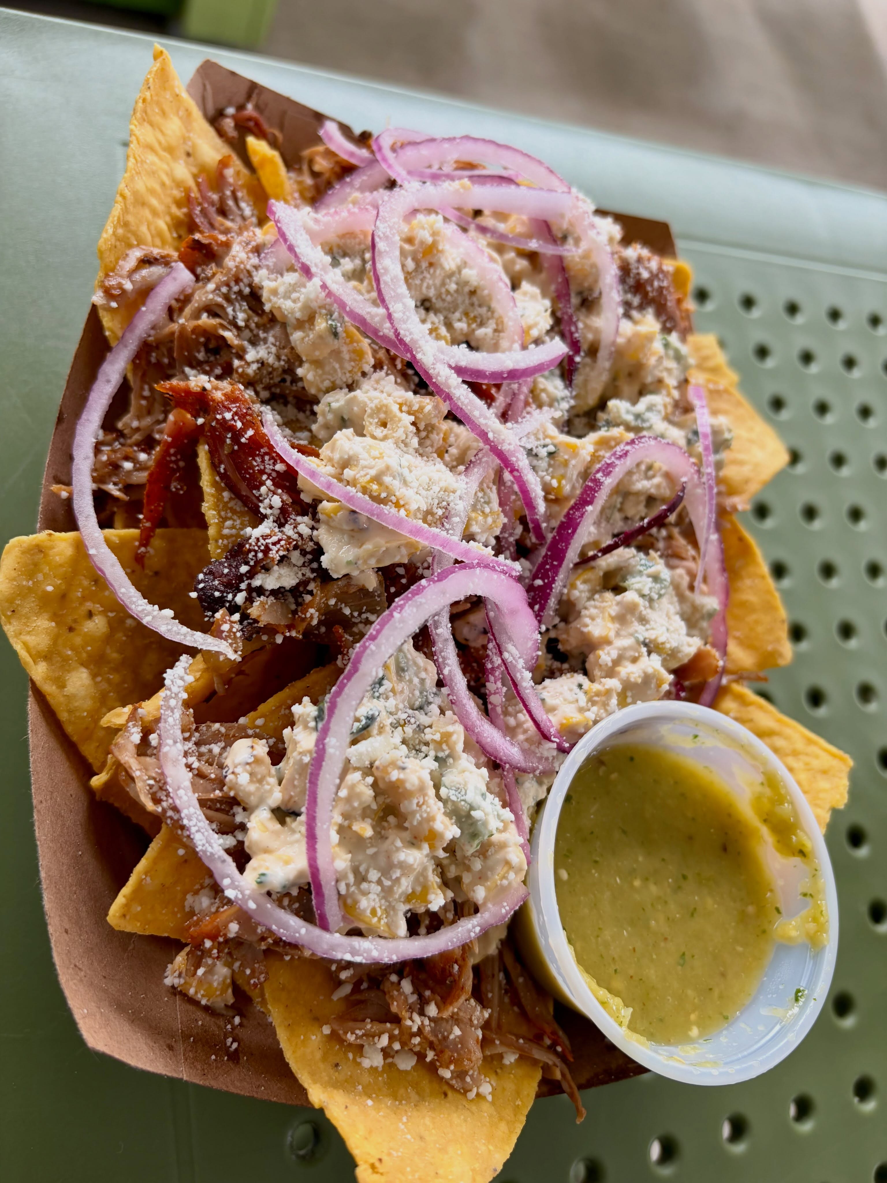 All restaurant week long, we’re serving up our Yucatán-style pork shoulder-Birria fusion! Cochinita Nachos: tortilla chips topped with juicy pork, street corn, red onions, cotija, and spicy tomatillo