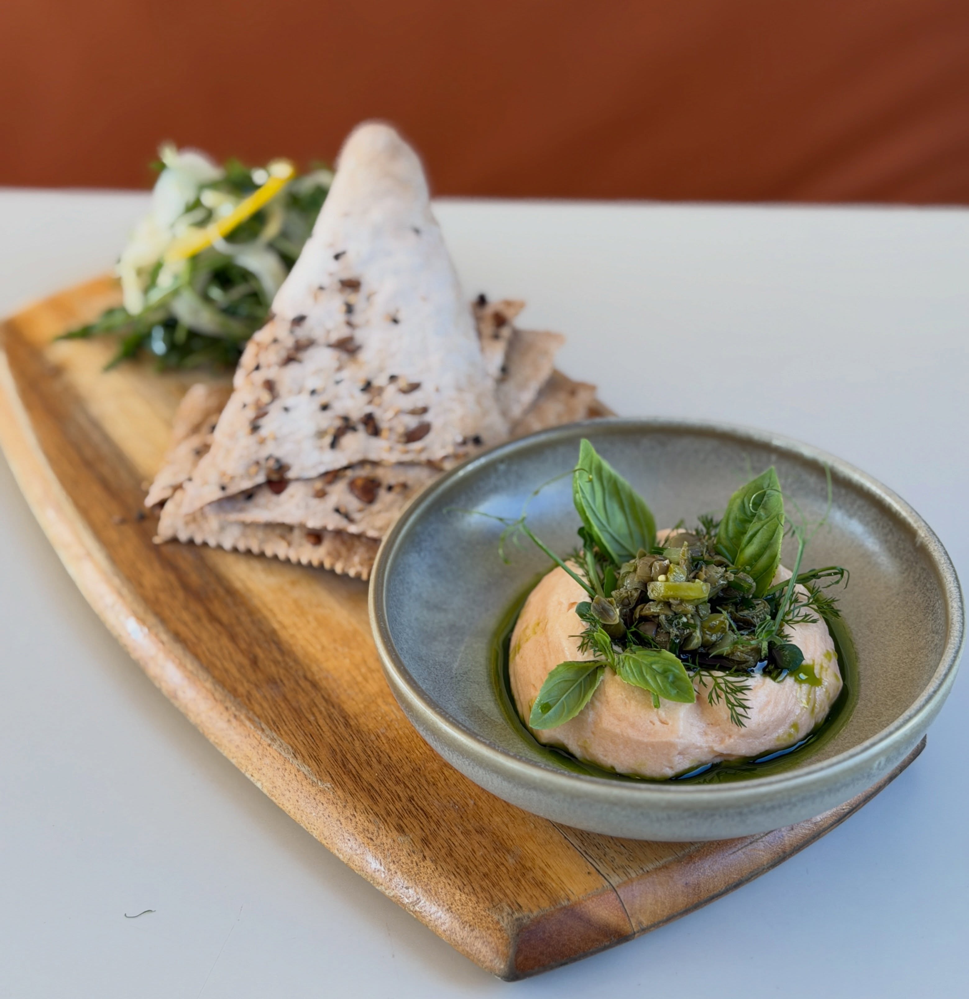 New item menu
Smoked salmon parfait with house made sourdough & pickle crackers and dragoncello salad.