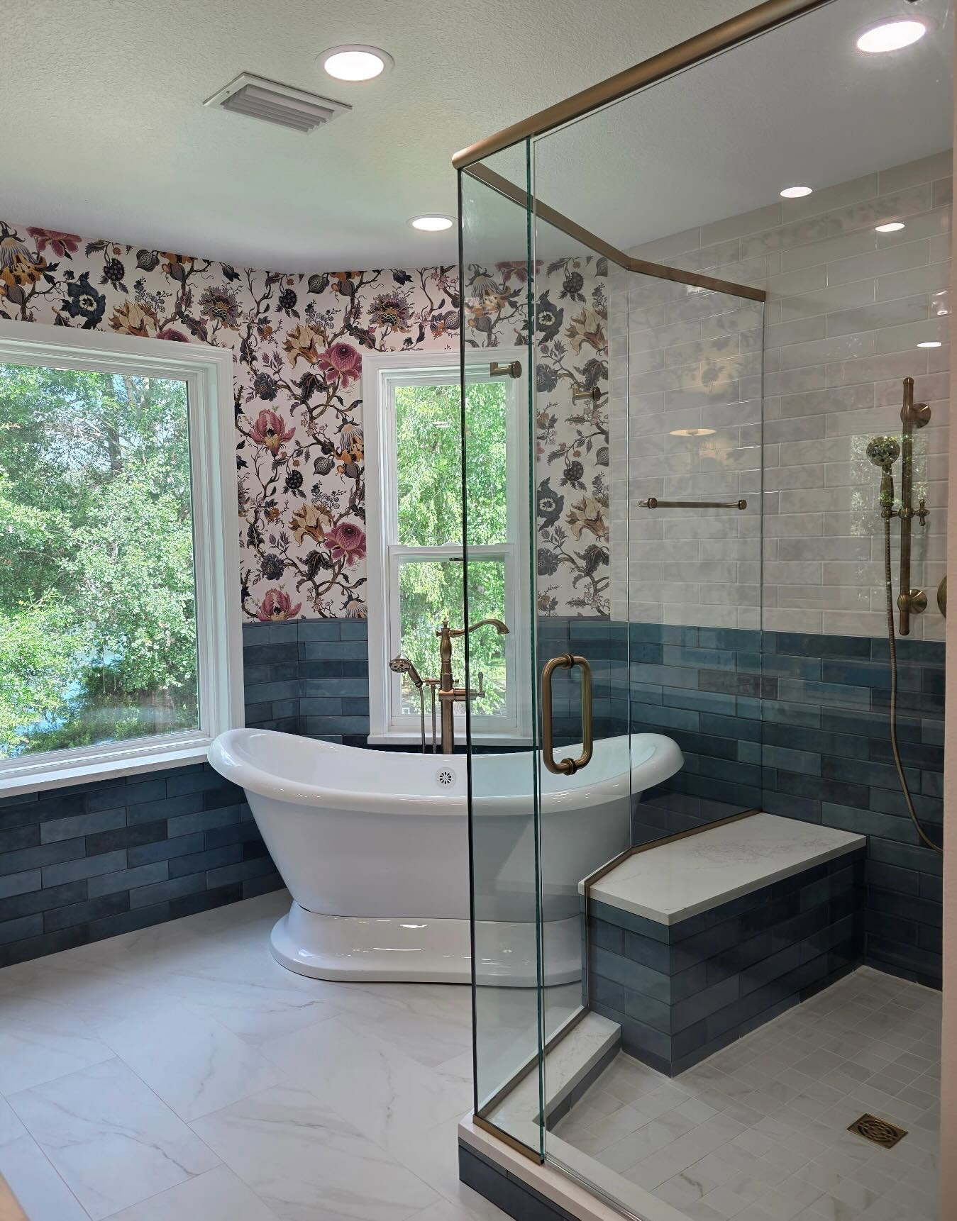 ✨ Bold. Beautiful. Unforgettable. ✨
This bathroom remodel is proof that wallpaper belongs in luxury spaces. A dramatic floral print paired with rich blue tile, warm brass fixtures, and a freestanding soaking tub creates a retreat that feels both timeless and unexpected.
We layered texture, color, and pattern to transform an ordinary bathroom into a true statement space—where every detail was designed to make an impact.
Who says bathrooms have to play it safe?
🌿 Custom tile work
🛁 Freestanding soaking tub
🌸 Statement wallpaper
✨ Designer brass finishes
Ready to turn your bathroom into your favorite room in the house?