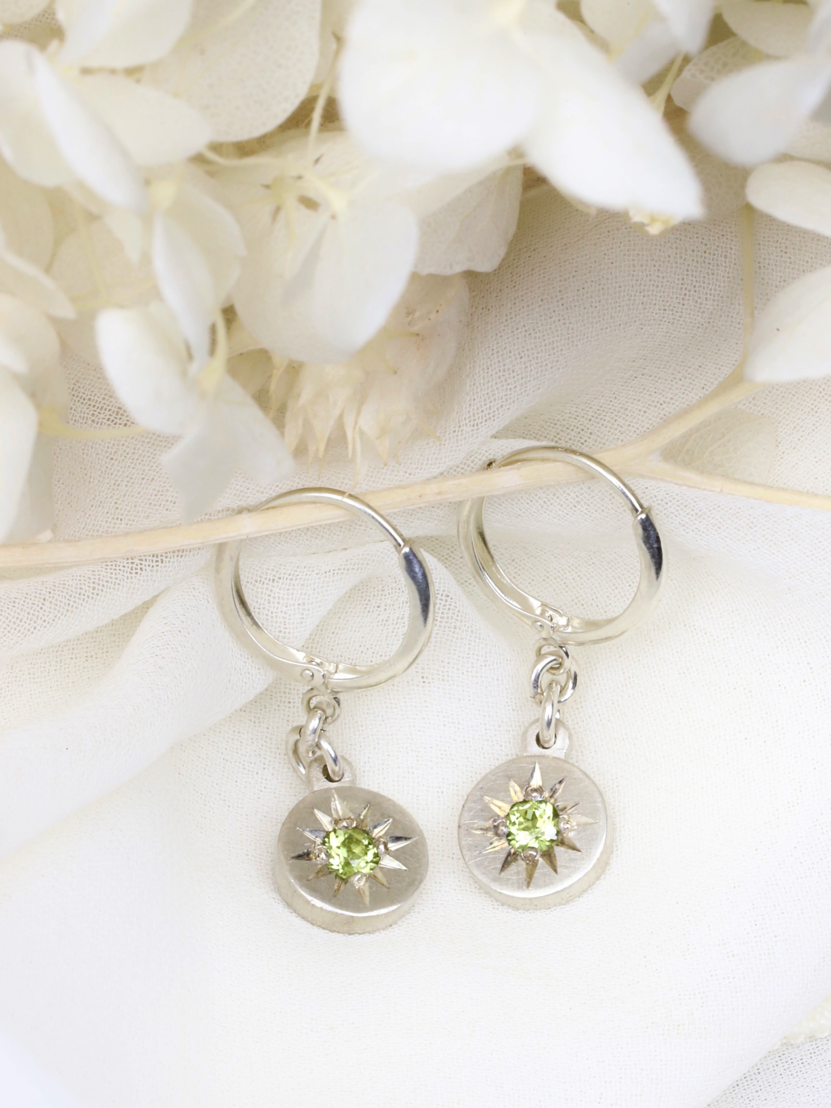 Brighten someone’s August with these stunning Star Hoop Earrings, handcrafted by Adele Stewart in sterling silver and set with vibrant green peridot. 💚
A beautiful birthstone gift or the perfect way to celebrate your own August birthday.
Available now for $280 🌱🤍
#birthstone #peridot #augustbirthstone #sterlingsilver #handmadejewellery