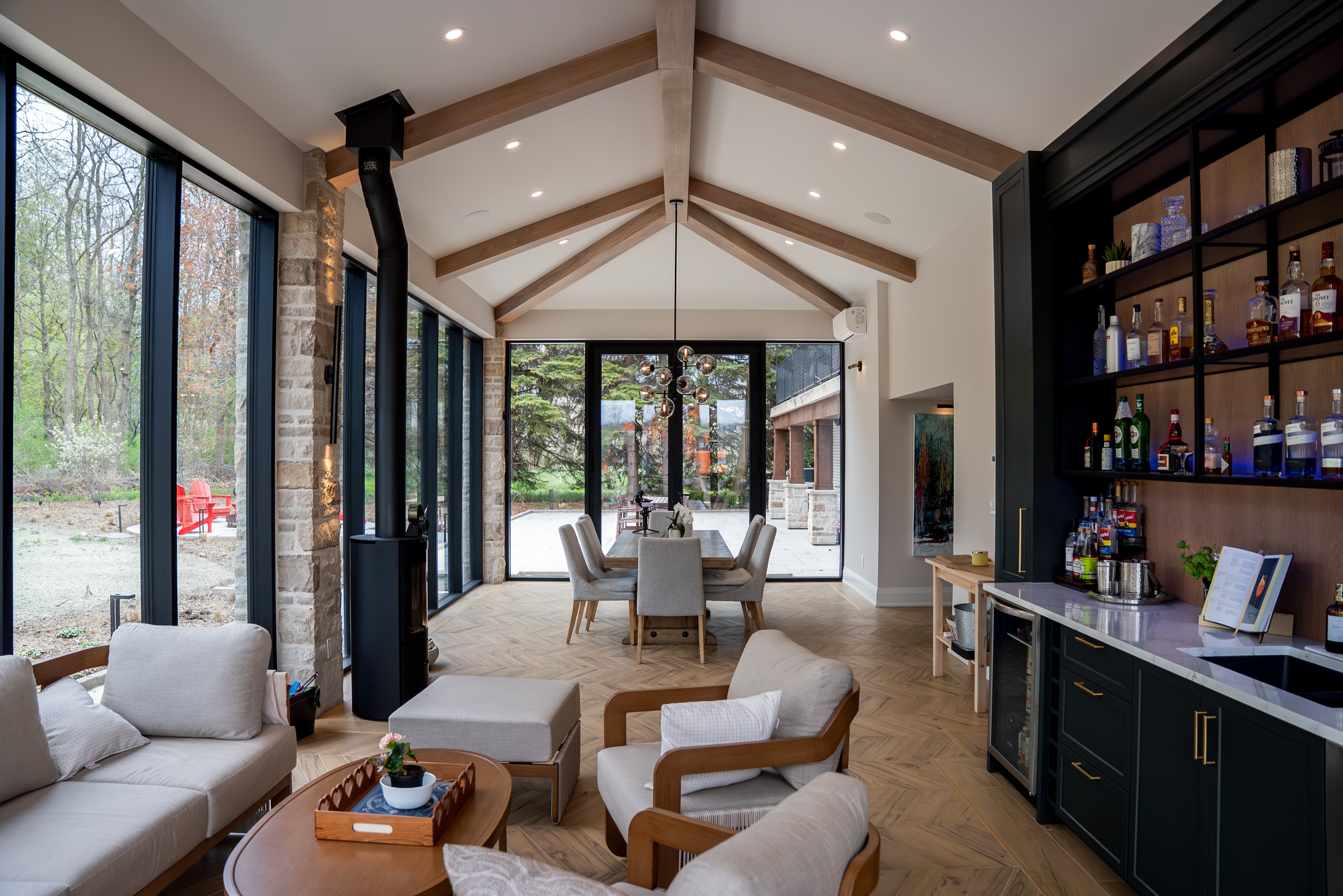 Phase 1 is complete, and what an opening statement.
This space was designed to dissolve the line between inside and out. Vaulted white oak beams carry the eye upward while walls of glass pull the surrounding forest right into the room.
Architecture: @jordanstationdesignco
Builder: @tuckerhomes
Photography: @adhousesocial
Phase 2 is currently under construction.
