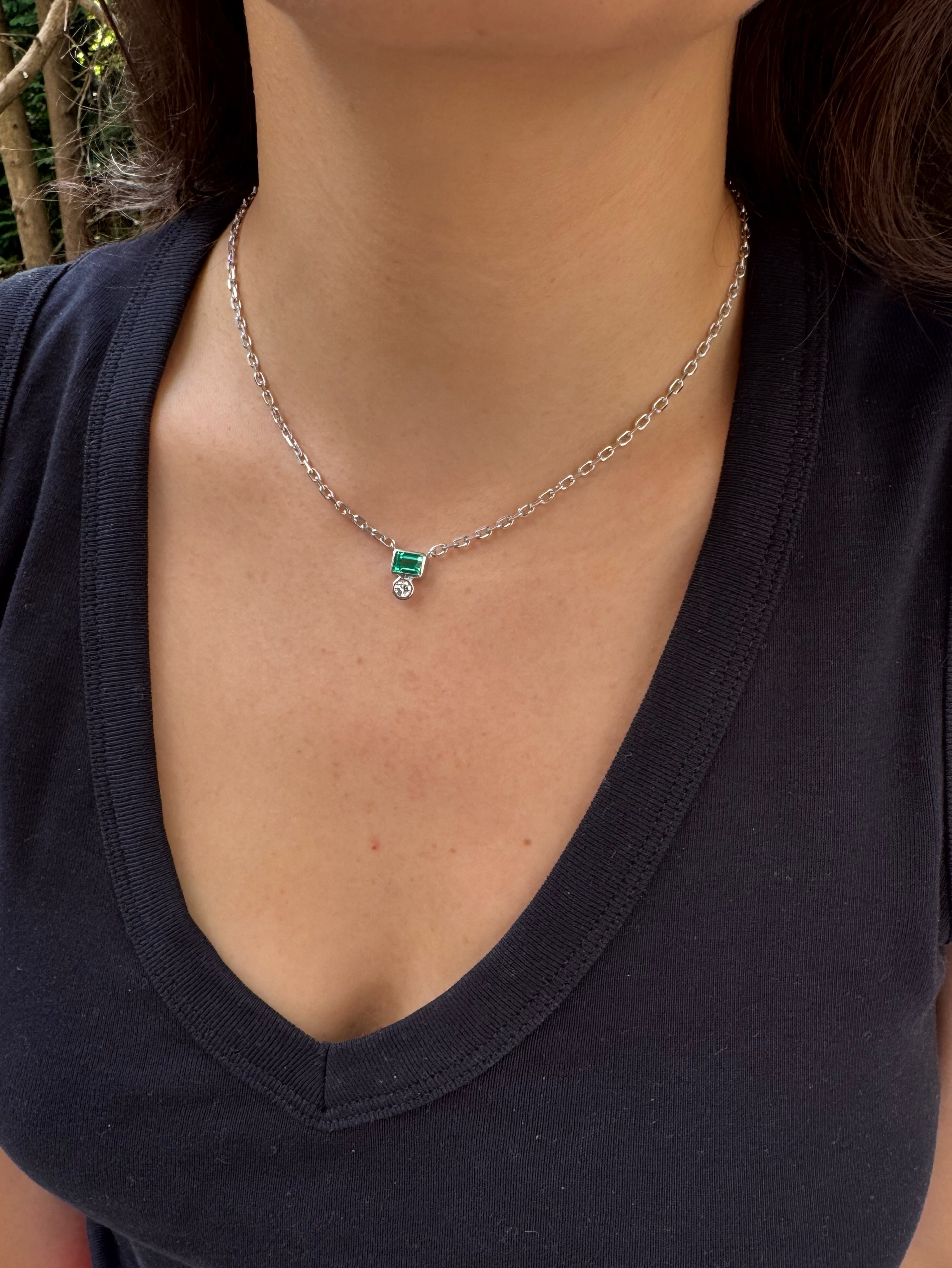 A reset for a client who had a diamond and a green emerald - they got the Emmerson treatment in a stacked pendant, white gold 🤍