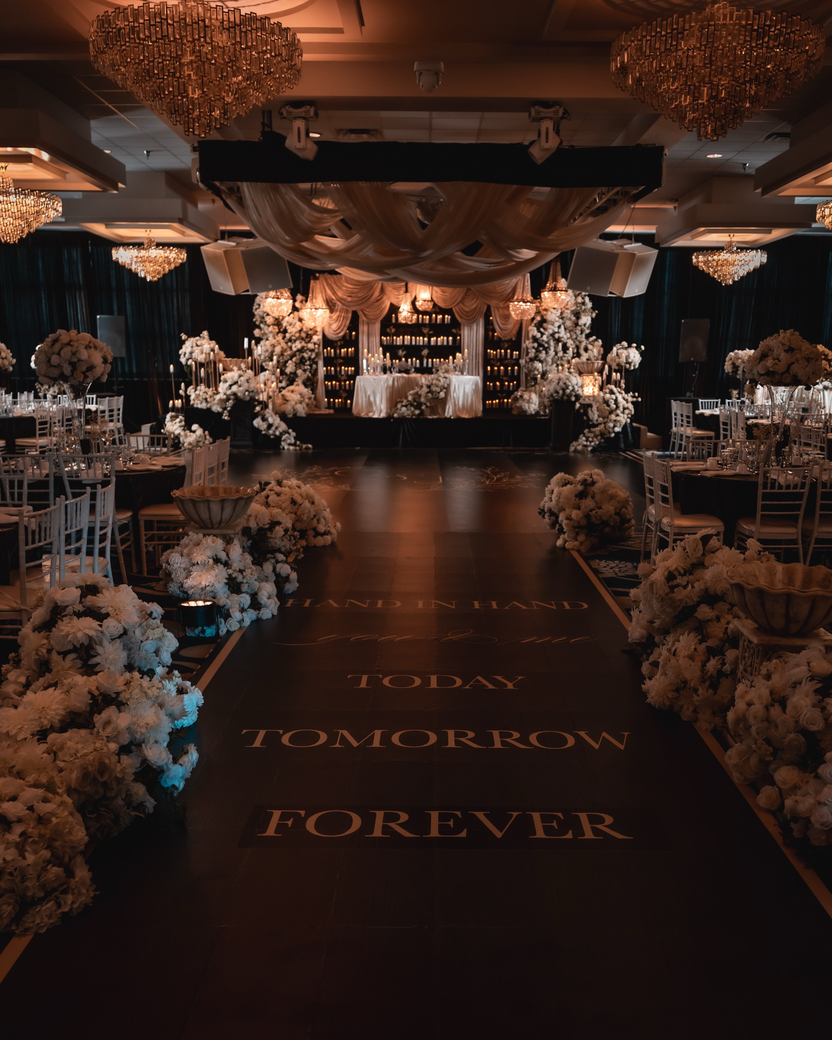 A night wrapped in candlelight, layered draping, and timeless details. Every corner was designed to feel warm, romantic, and unforgettable.
From the statement walkway to the cascading florals and personalized touches, this celebration was all about creating an experience guests could truly feel.
Hand in hand, today, tomorrow, forever.
Design, Decor & Florals @universaldecor
Captured by @paulreyatphotography
@dhaliwalbanquethall @infiniteimpressions_ @sequelproductionsbc @decibelvan @shadesportraitstudio
#WeddingDesign #LuxuryWedding #WeddingReception #WeddingDecor #EventDesign