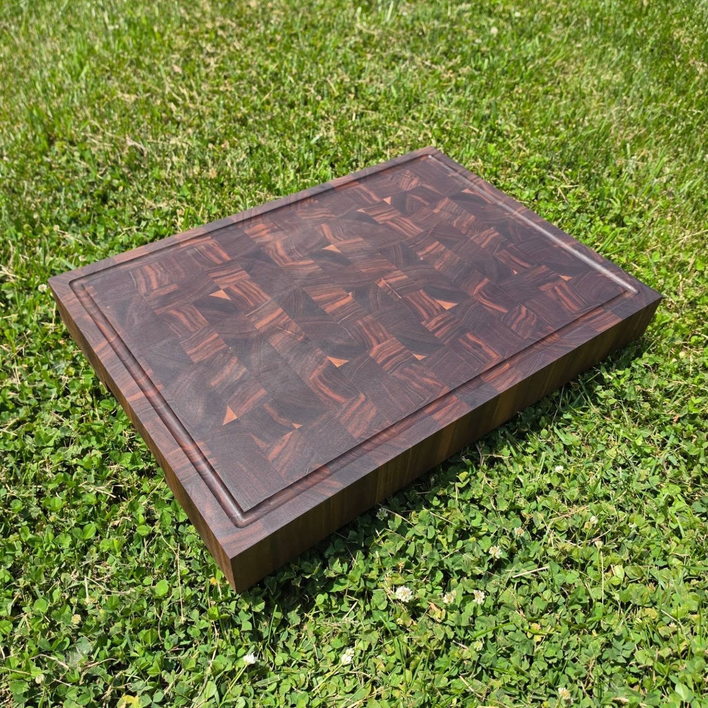 New Product Launch!
After years of making them only as custom requests, end grain cutting boards are finally available to order on my website!
Built to last, these boards are as functional as they are beautiful. End grain construction is gentler on knife edges, incredibly durable, and can last for generations with proper care.
Available in: • Black Walnut • Hard Maple • Cherry
Two sizes: 12" × 18", 18" × 24"; with either size being 2" or 3" thick
Every board features a built-in hand hold on the underside for easy lifting, and you can choose to add an optional juice groove on the top surface.
Pricing starts at $200
Order yours today!
The board pictured is an 18" × 24" Black Walnut end grain cutting board that is 3" thick
.
.
.
#Woodworking #EndGrainCuttingBoard #CuttingBoard #BlackWalnut #WalnutWood