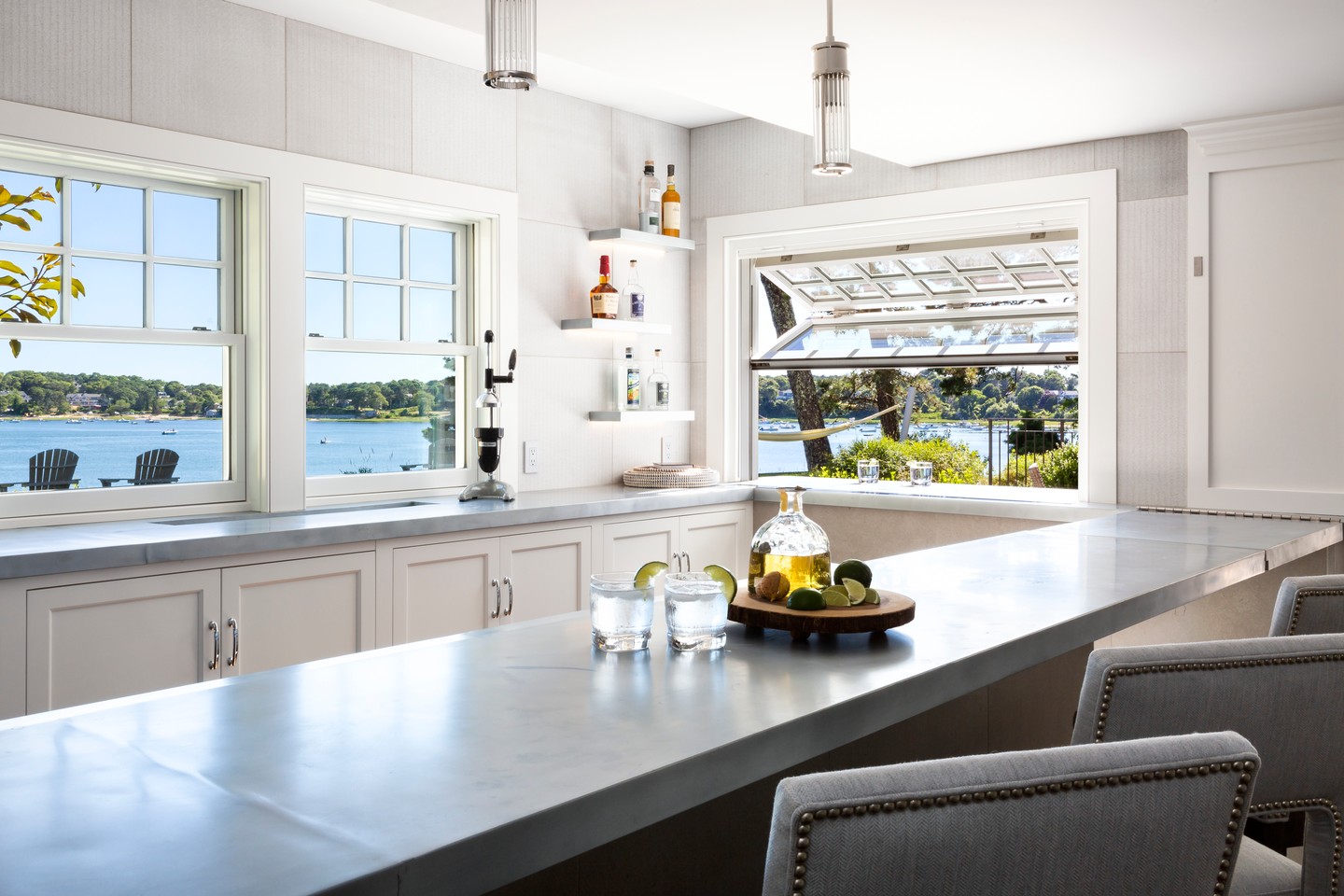 Working in collaboration with SV Design, the project repositions the home’s laundry and television areas to open the exterior walls to natural light, outdoor views and a stronger connection to the pool. The reimagined space now features a poolside kitchen and seating area, an indoor-outdoor bar, a billiards area and an ultra-modern wine display with integrated storage.
Every element was thoughtfully considered to create a sophisticated gathering place that feels equally suited to relaxed afternoons by the pool and evenings spent entertaining family and friends.
Architect: @svdesign_architectureinteriors
Builder: Cape Associates
Photography: @amberjanephoto
Explore the full project in our portfolio. Link in bio.
#CapeAssociates #SVDesign #FoxsDen #CapeCodHomes #CapeCodArchitecture #HomeRenovation #IndoorOutdoorLiving #CustomBuilding #LuxuryInteriors #PoolsideLiving