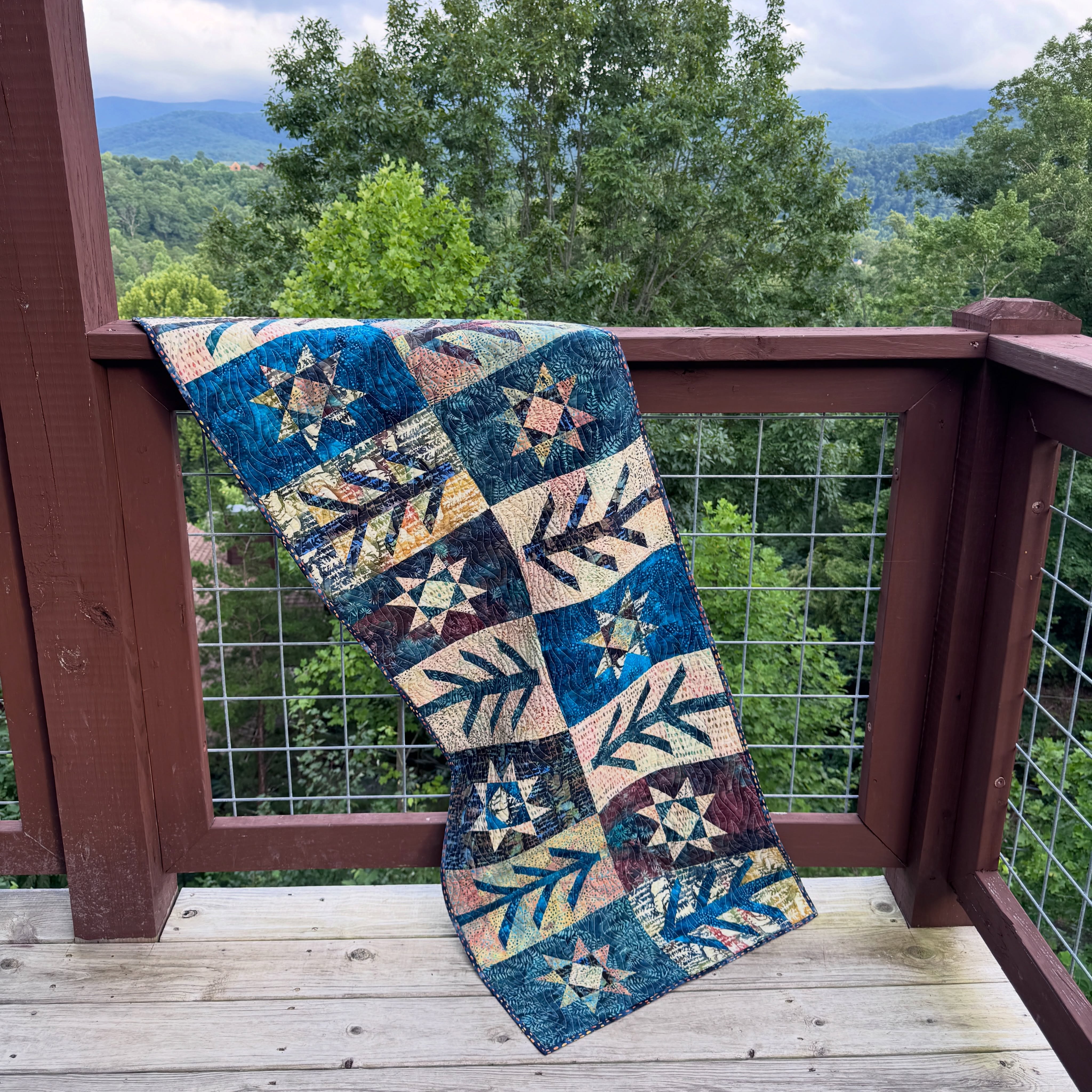 Stargrove Pattern: FQ mix and match version
The Table Runner is 1 of 4 included sizes
Fabrics: Twigs and Tails by Jerry Khiev for Island Batiks and @luminfabrics
Quilting by @toldyousew_quilts with the Metal panto by @thequiltingmill
