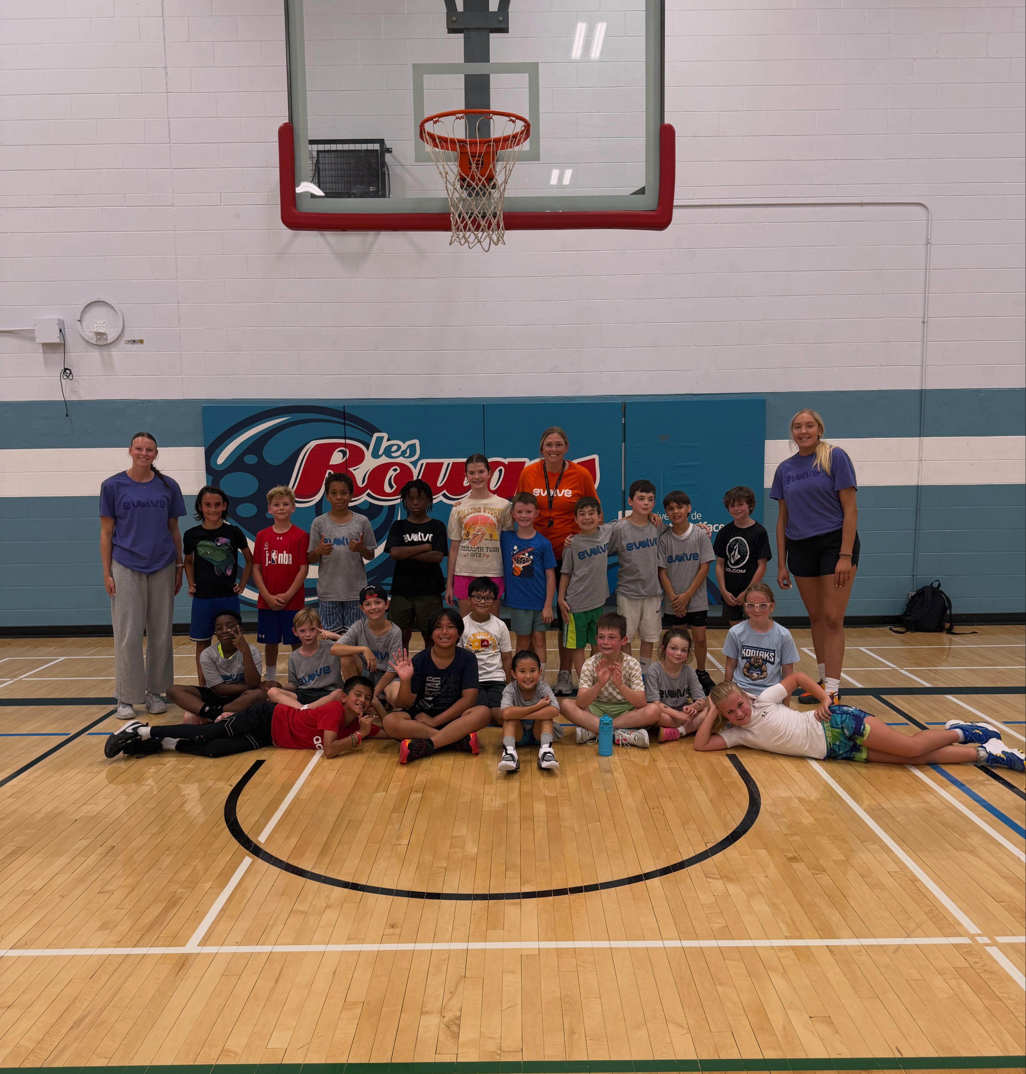 Boom!
Week 2 was a blast!
We were very fortunate to have 2 more fantastic groups filled with eager and interested youth who were looking to evolve their game this summer!
Huge thanks to all of our families who trusted in us with their child's development in the game we love this summer!
Huge thanks to our coaches, Coach Lilly Vendegraff, Coach Keylyn Filewich, Coach Donald Stewart, Coach Jon Lundgren, Coach Sarah Lundgren and Coach Nick Lother for their hard work and sharing so much knowledge with our campers this week. What a staff!
We're going to take a small break and recharge the batteries while we prepare for our upcoming club team tryouts mid-August.
If you're looking for programming of any kind for male and female basketball players aged 5-18 for the 2026-2027 season don't hesitate to reach out to us directly or send an email to our Program Director, Nicholas Lother at nicholas@evolvebasketball.ca
Learn, Grow, Evolve!